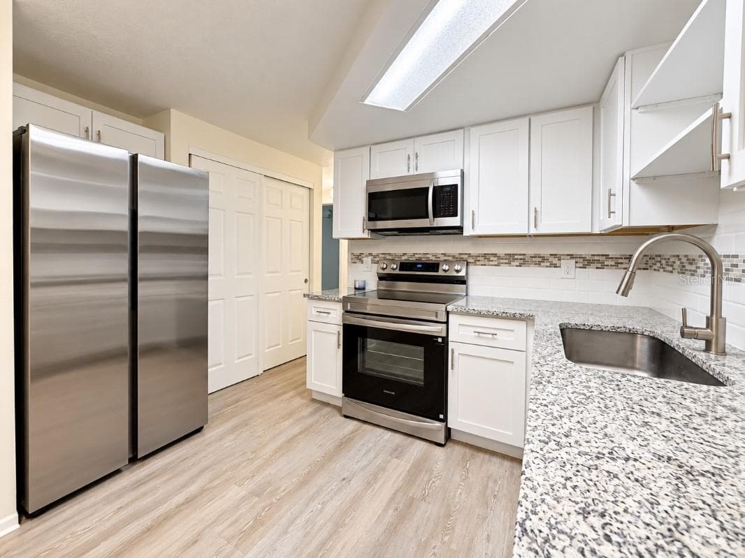 Single Family Residence at 10032 KINGSWOOD LN, PORT RICHEY, photo 9 of 18