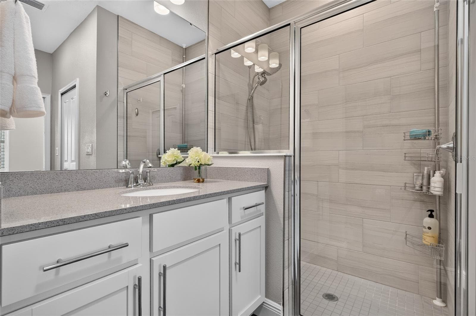 walk in shower with floor to ceiling ceramice tile - 4408 BEDFORD WAY, LEESBURG