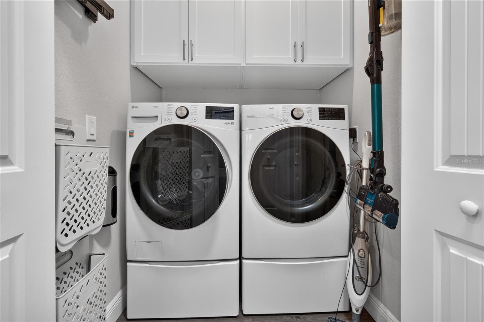 Laundry room with custom built in storage - 4408 BEDFORD WAY, LEESBURG