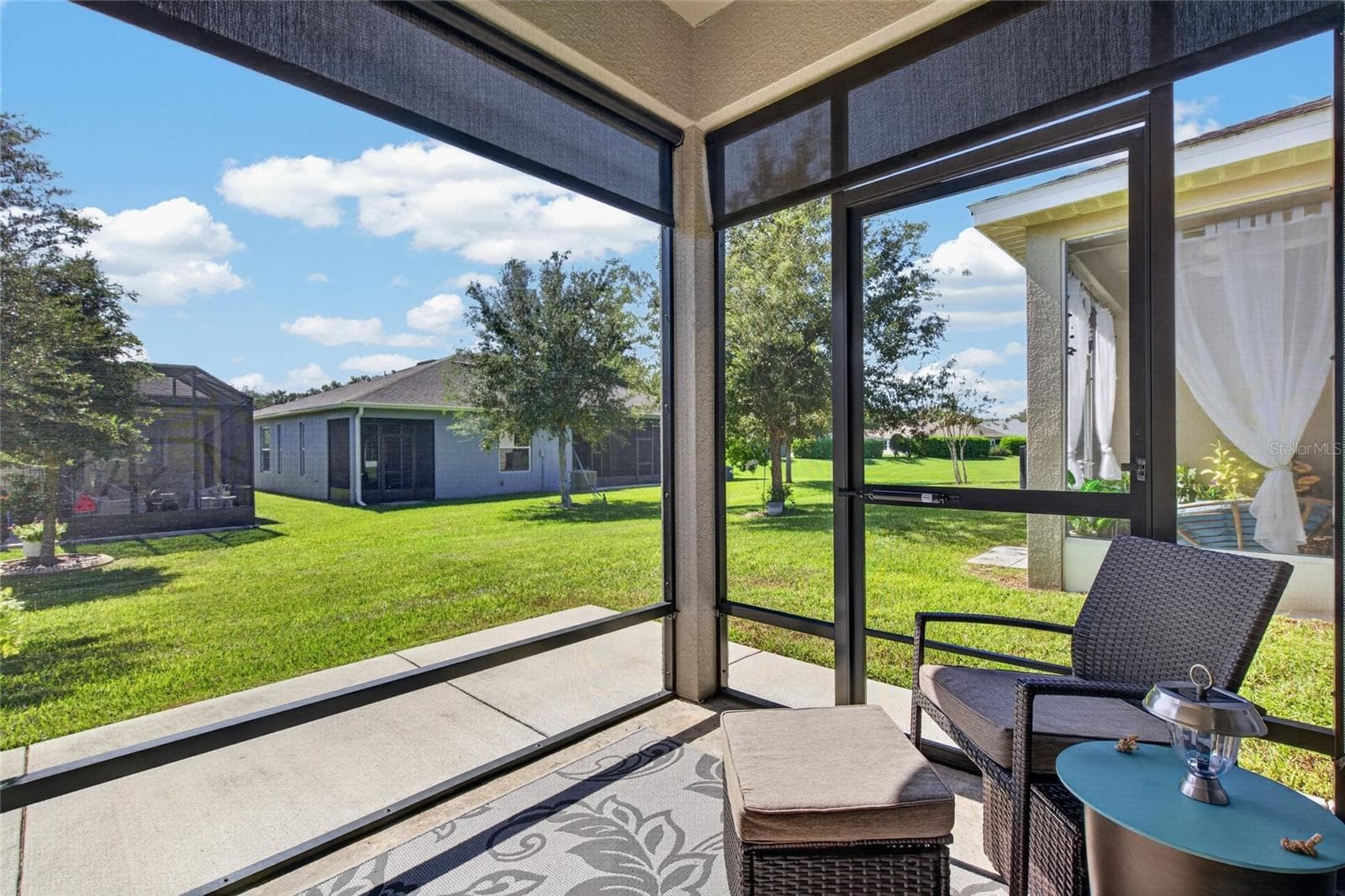 Screen lanai with roller sun shades - 4408 BEDFORD WAY, LEESBURG