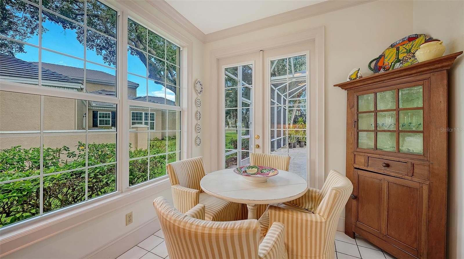 IMPACT WINDOWS: Dinette Area w/Lanai Access - 227 SAINT JAMES PARK, OSPREY