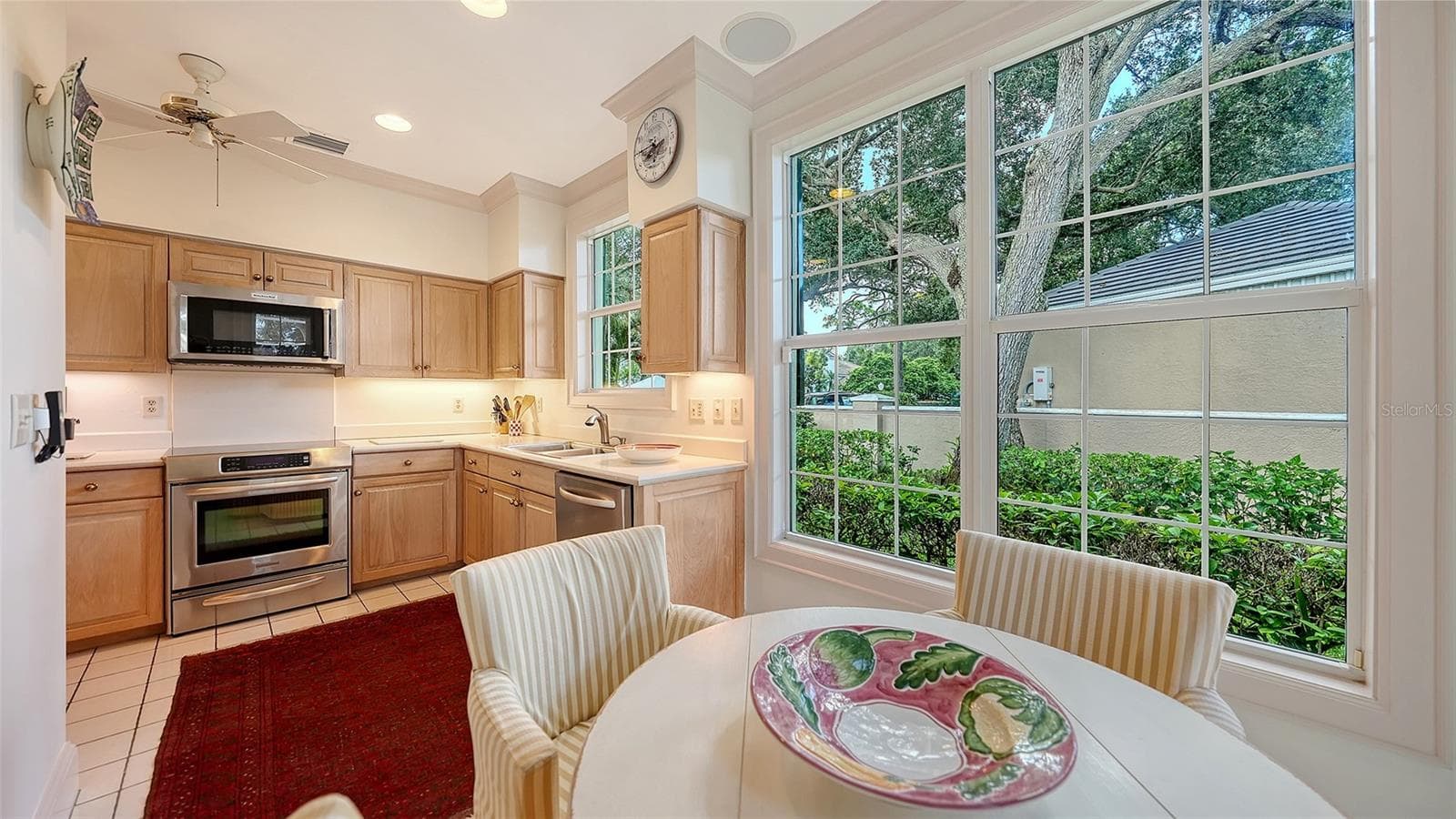 HURRICANE IMPACT WINDOWS: Wood Cabinetry & Stainless KITCHENAIDE Appliances - 227 SAINT JAMES PARK, OSPREY