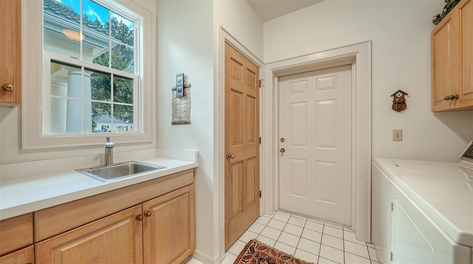 Laundry Room w/Cabinetry & Sink + Utility Closet - 227 SAINT JAMES PARK, OSPREY