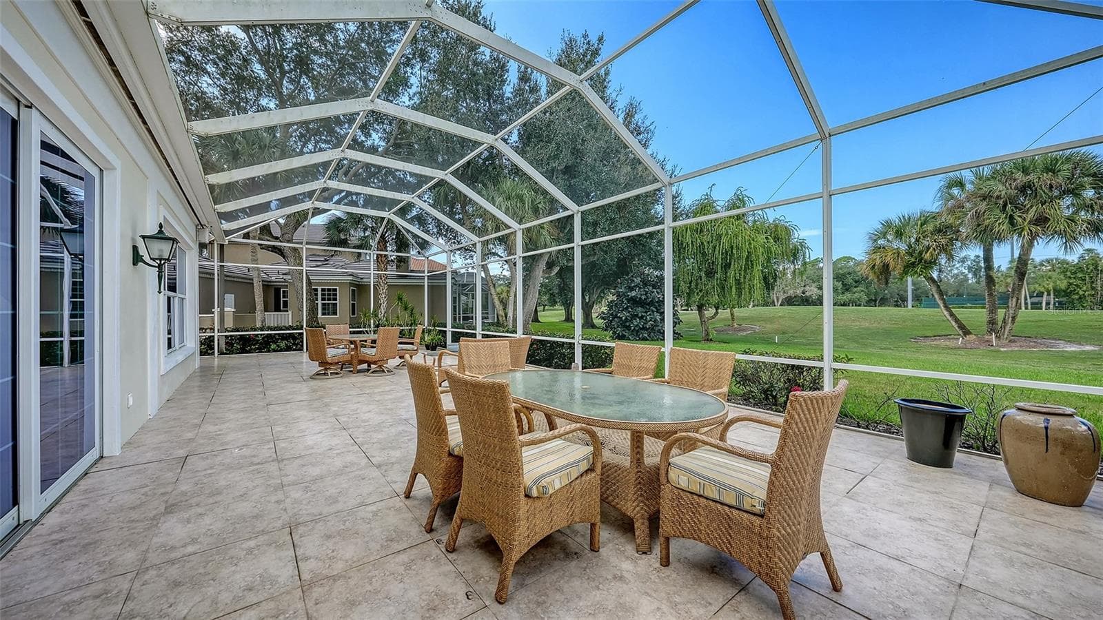 48 x 20 foot Screened and Tiled Lanai Overlooking Eagle Golf Course - 227 SAINT JAMES PARK, OSPREY