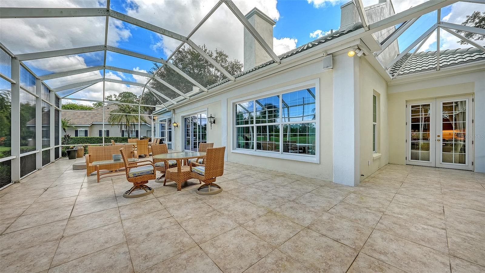 48 x 20 foot Screened and Tiled Lanai Overlooking Eagle Golf Course - 227 SAINT JAMES PARK, OSPREY