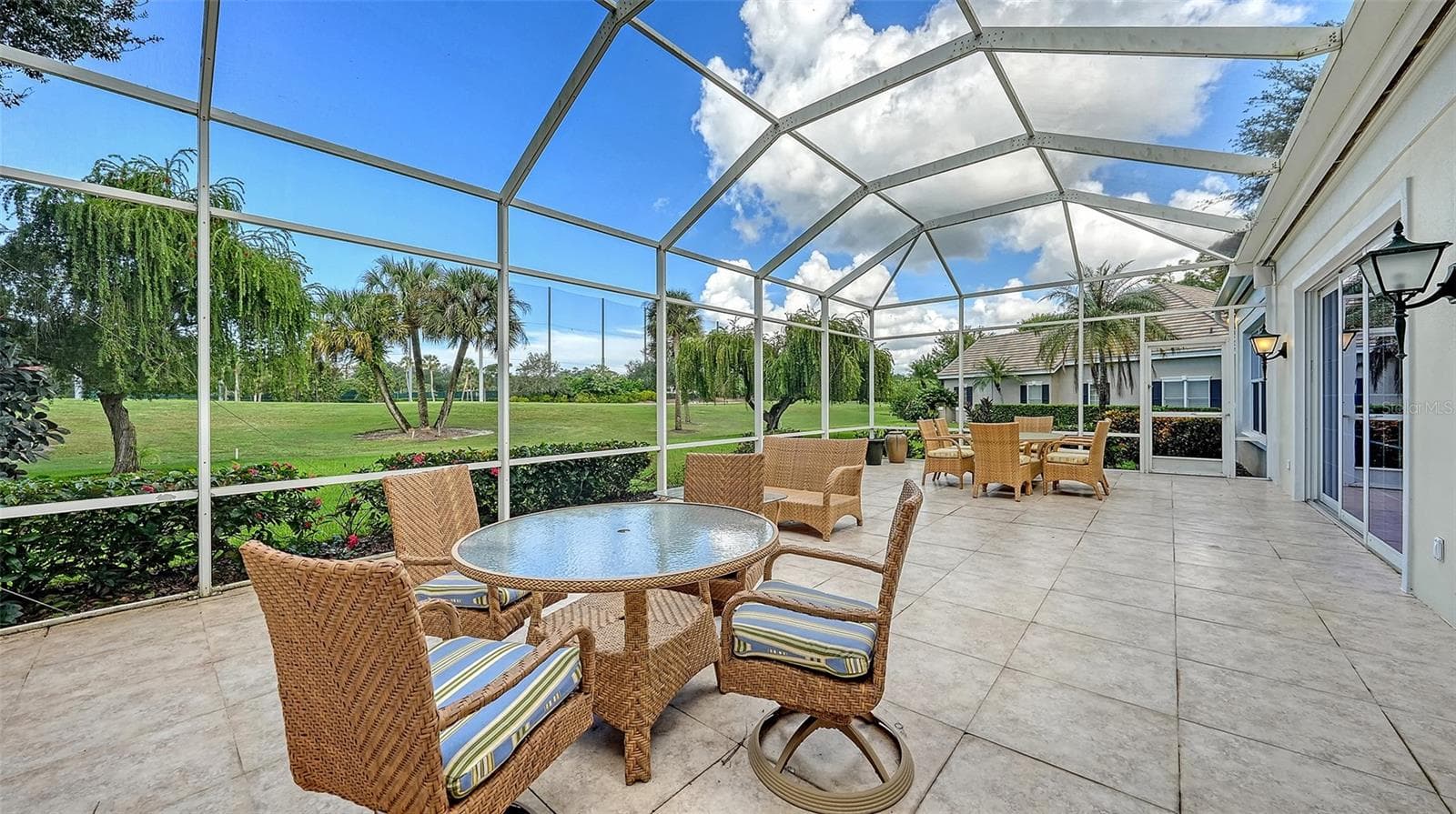 48 x 20 foot Screened and Tiled Lanai Overlooking Eagle Golf Course - 227 SAINT JAMES PARK, OSPREY