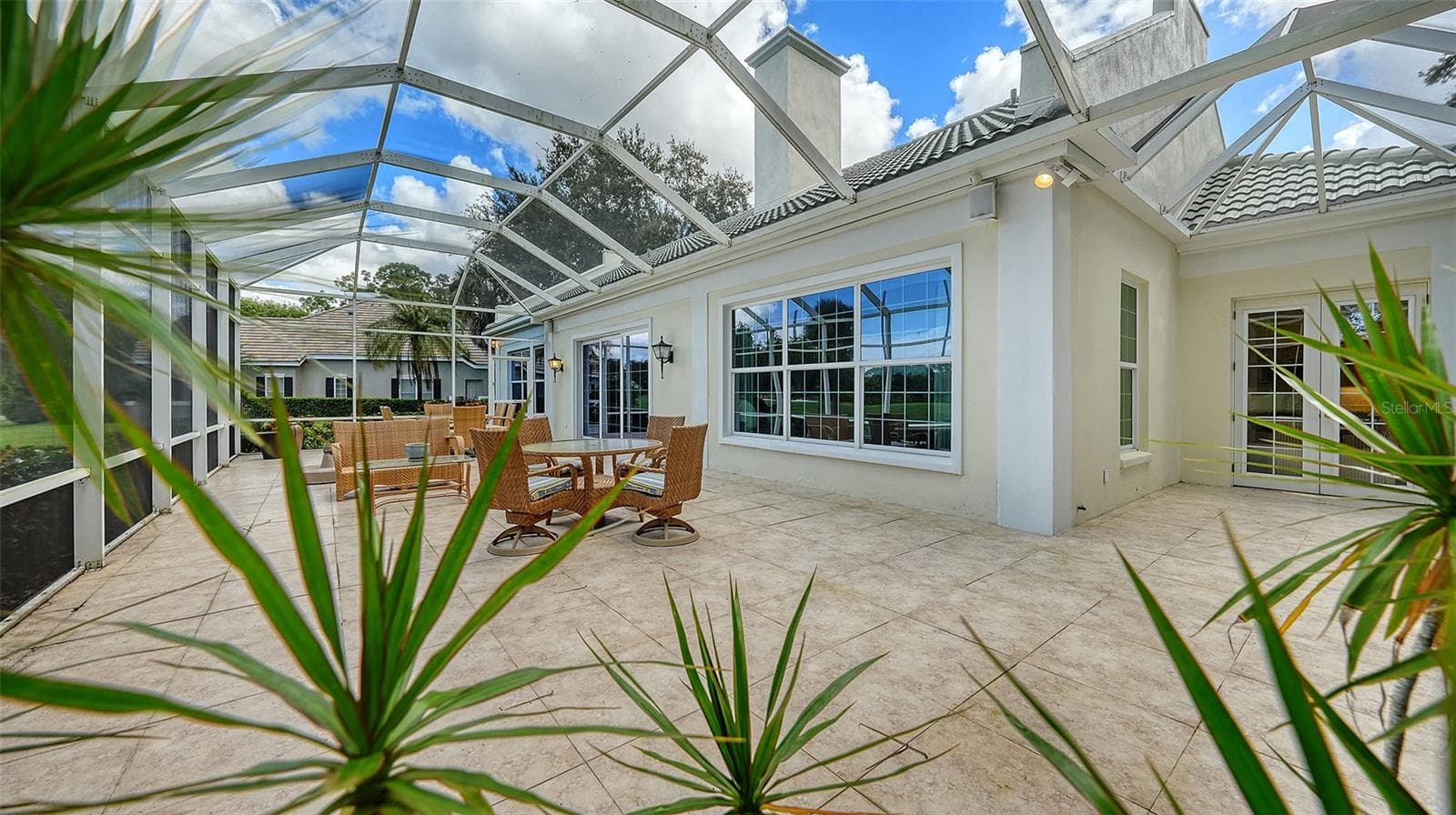 48 x 20 foot Screened and Tiled Lanai Overlooking Eagle Golf Course - 227 SAINT JAMES PARK, OSPREY