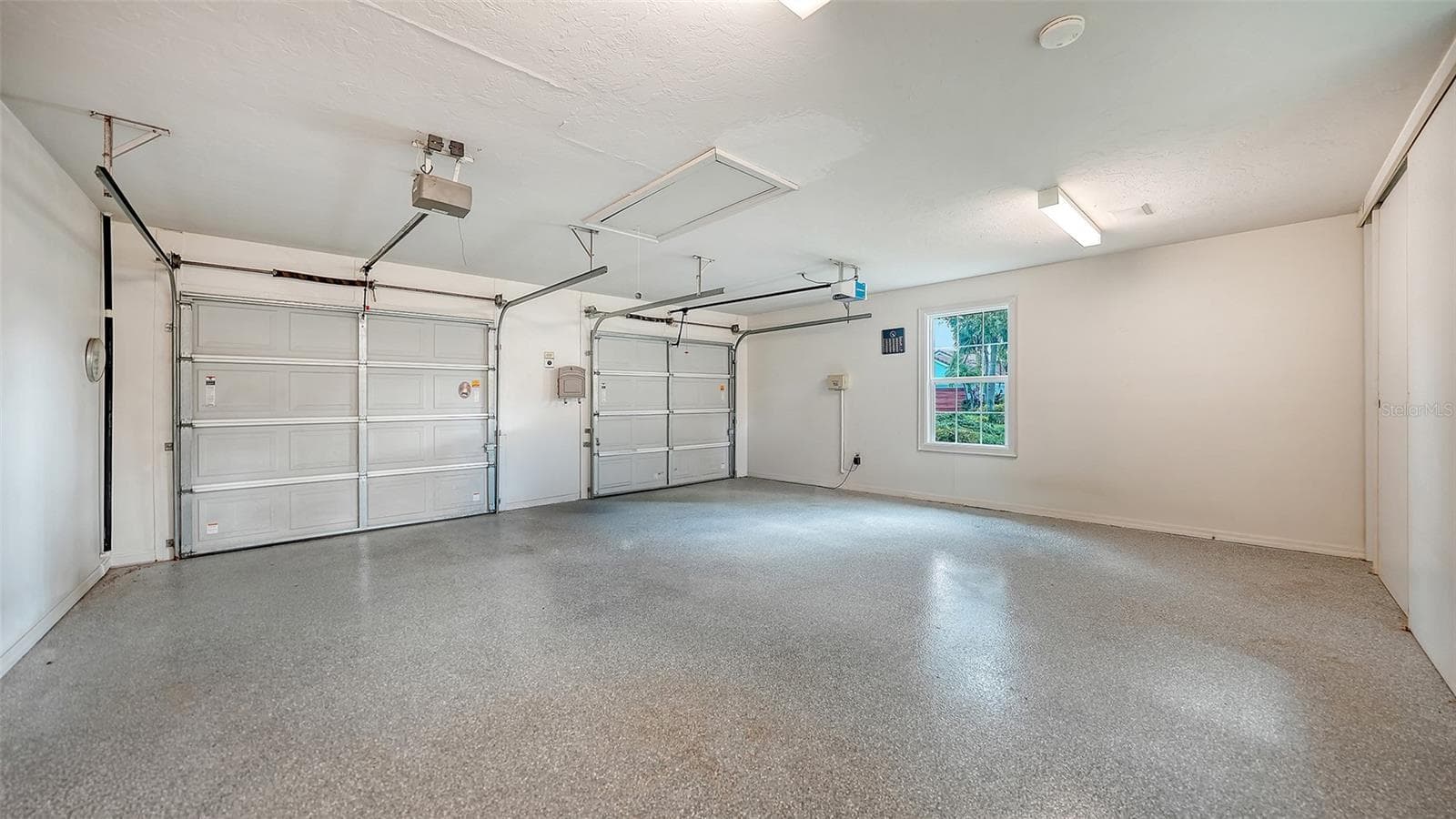 Over-Sized 2-Car Garage with Electric Charging Station - 227 SAINT JAMES PARK, OSPREY