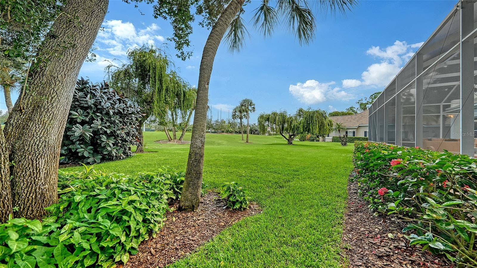 Lucious Landscaping in Rear of Property - 227 SAINT JAMES PARK, OSPREY