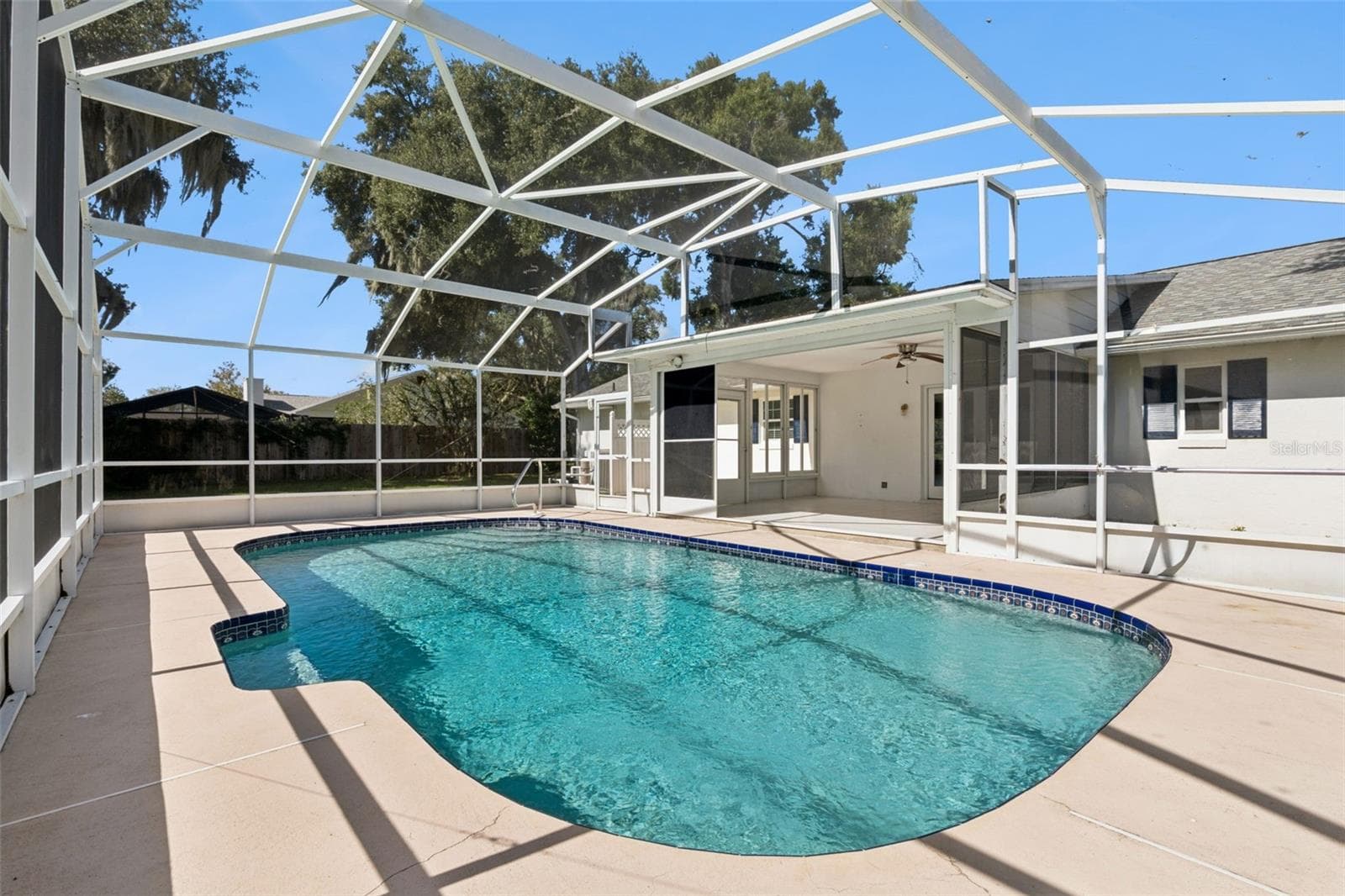 Your own screened pool, ready for sunny Florida afternoons - 5246 ROYAL OAK DR, FRUITLAND PARK