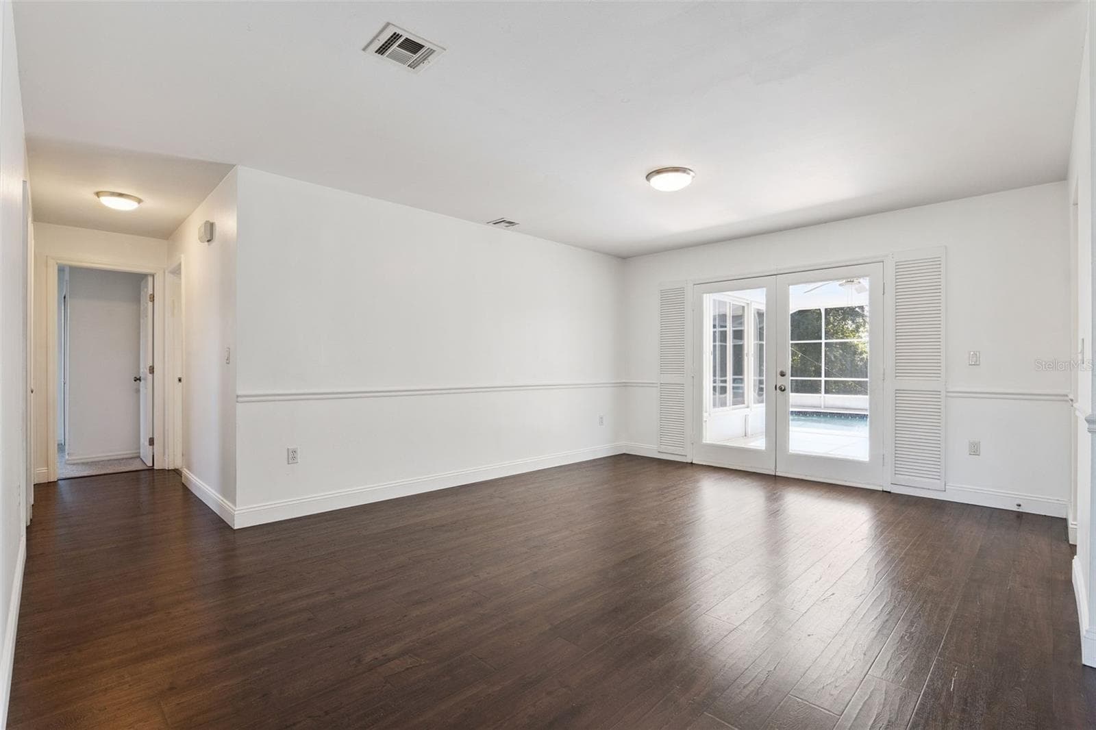 A second living area for movie nights, hobbies or a home office - 5246 ROYAL OAK DR, FRUITLAND PARK
