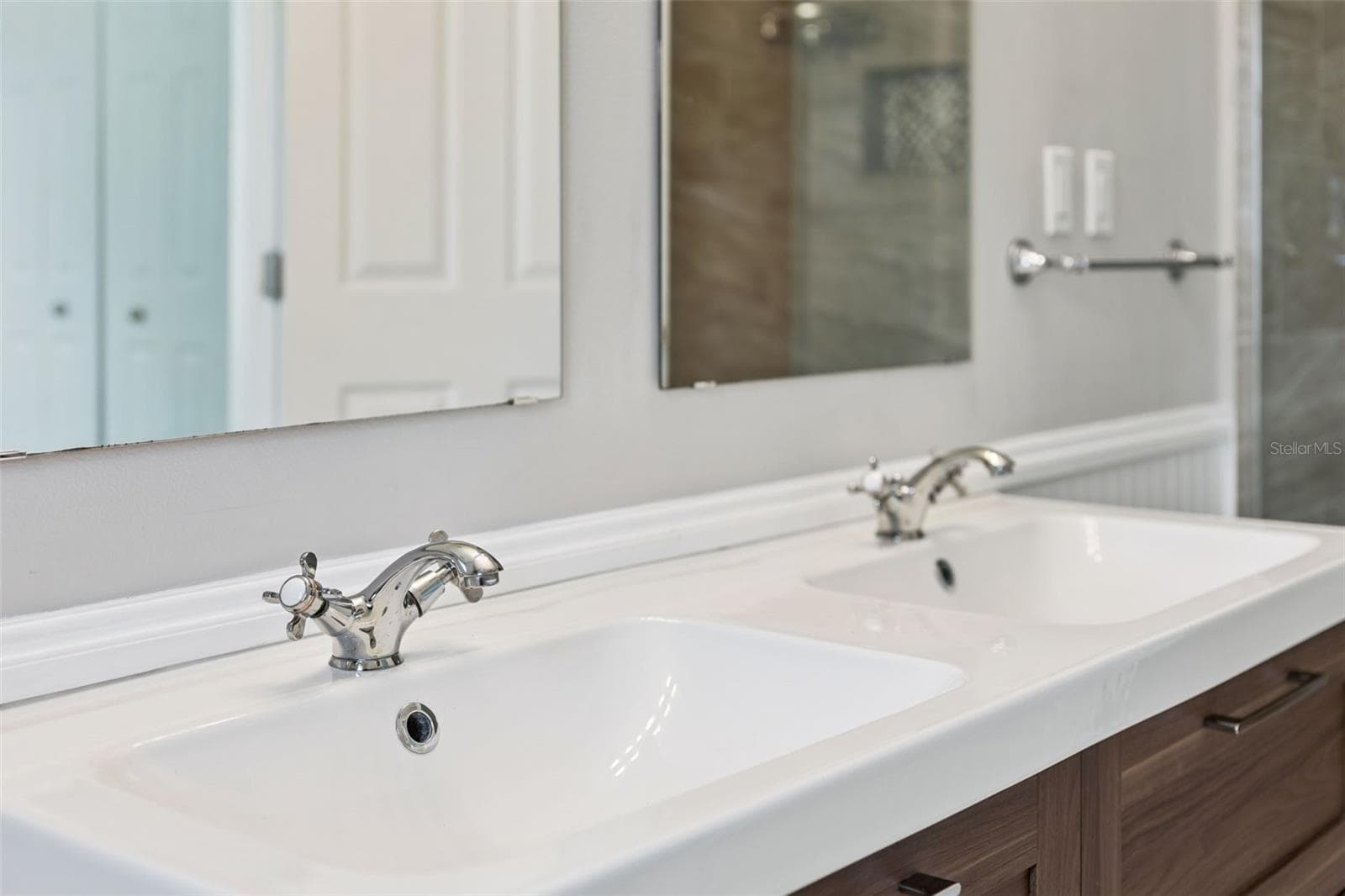 Polished fixtures and a clean, spa-like feel - 5246 ROYAL OAK DR, FRUITLAND PARK