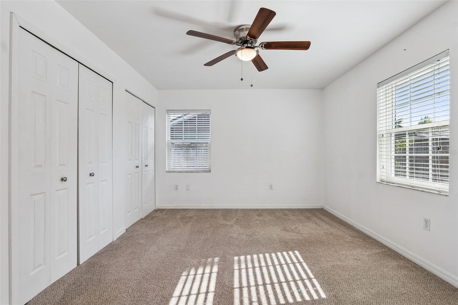 Roomy bedroom with plenty of closet space - 5246 ROYAL OAK DR, FRUITLAND PARK