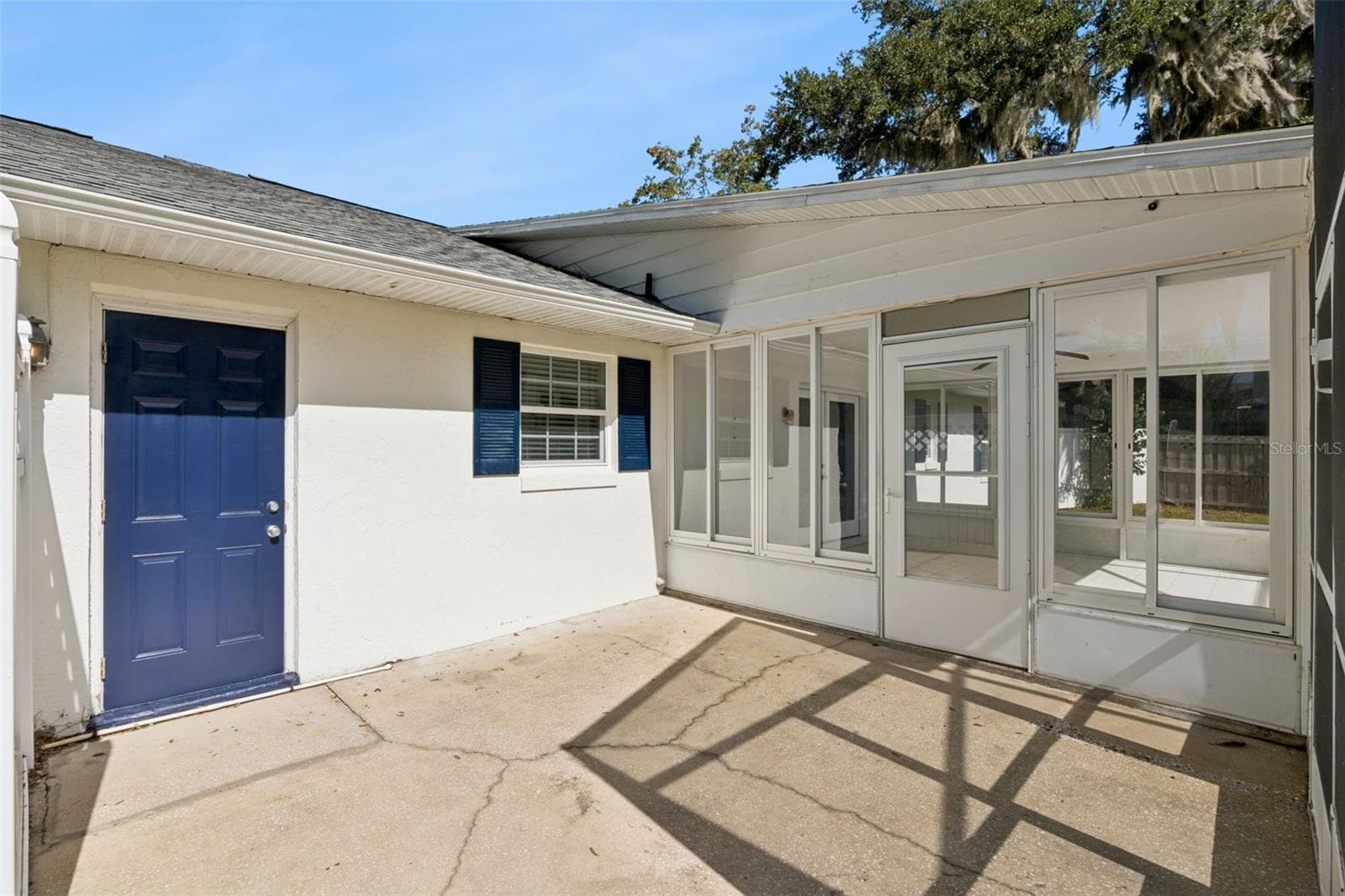 Shaded patio right off the Florida room - 5246 ROYAL OAK DR, FRUITLAND PARK