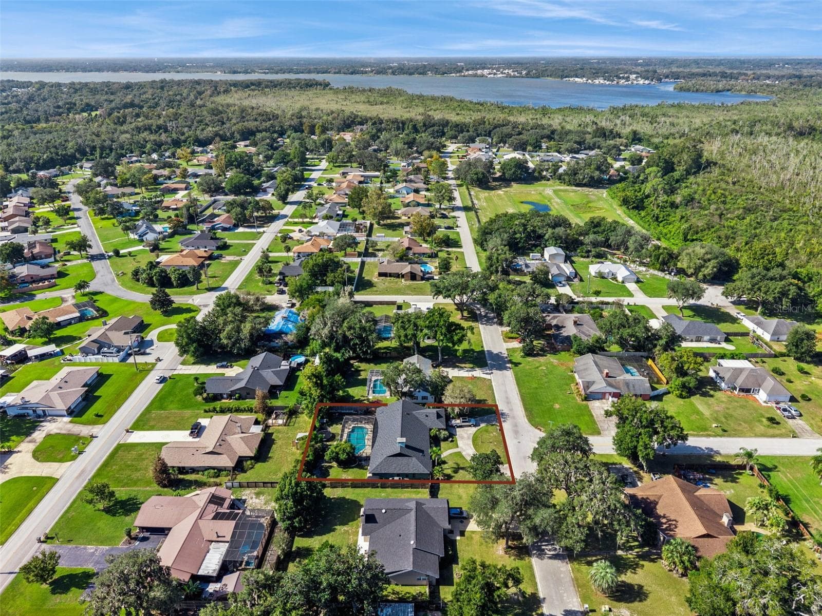 Lake living nearby, with water on the horizon - 5246 ROYAL OAK DR, FRUITLAND PARK