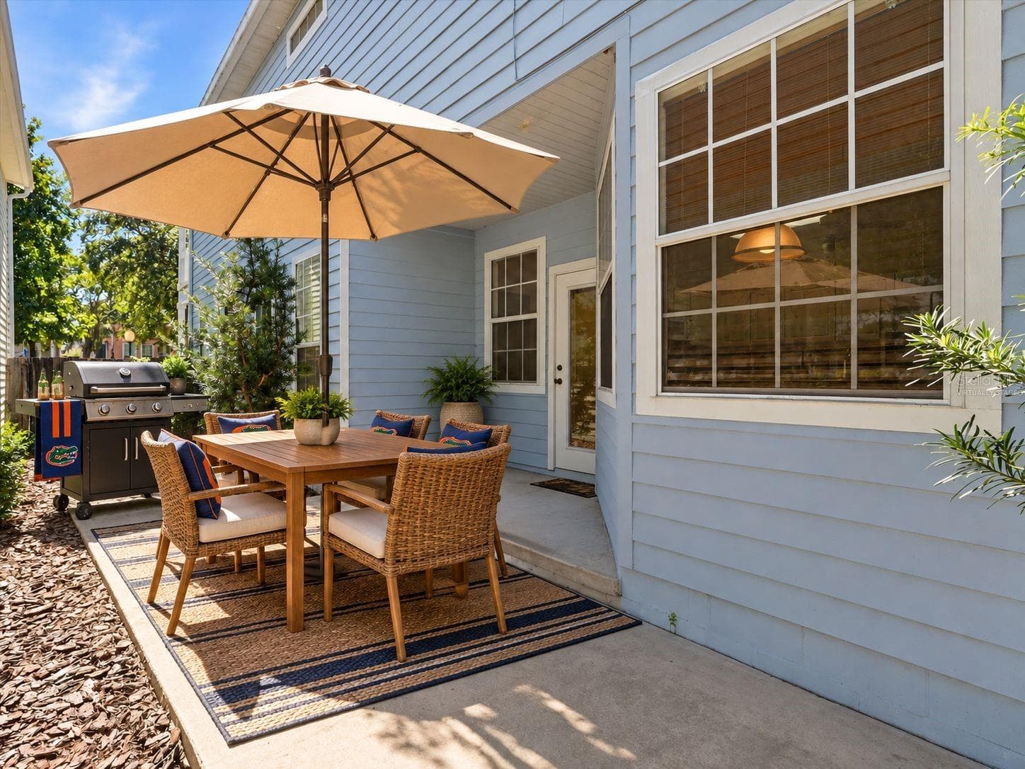 Virtually Staged - Patio off Kitchen and Dinette area - 11644 NW 18TH PL, GAINESVILLE