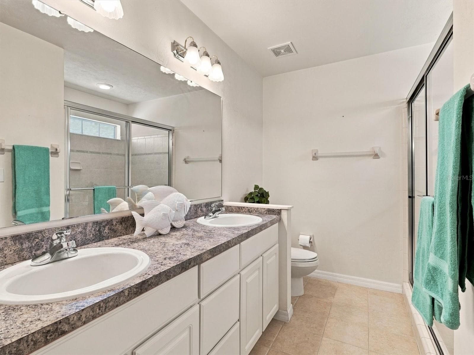 Primary En-Suite Bathroom, Dual Sinks, Closet, Large Shower, Toilet - 11644 NW 18TH PL, GAINESVILLE