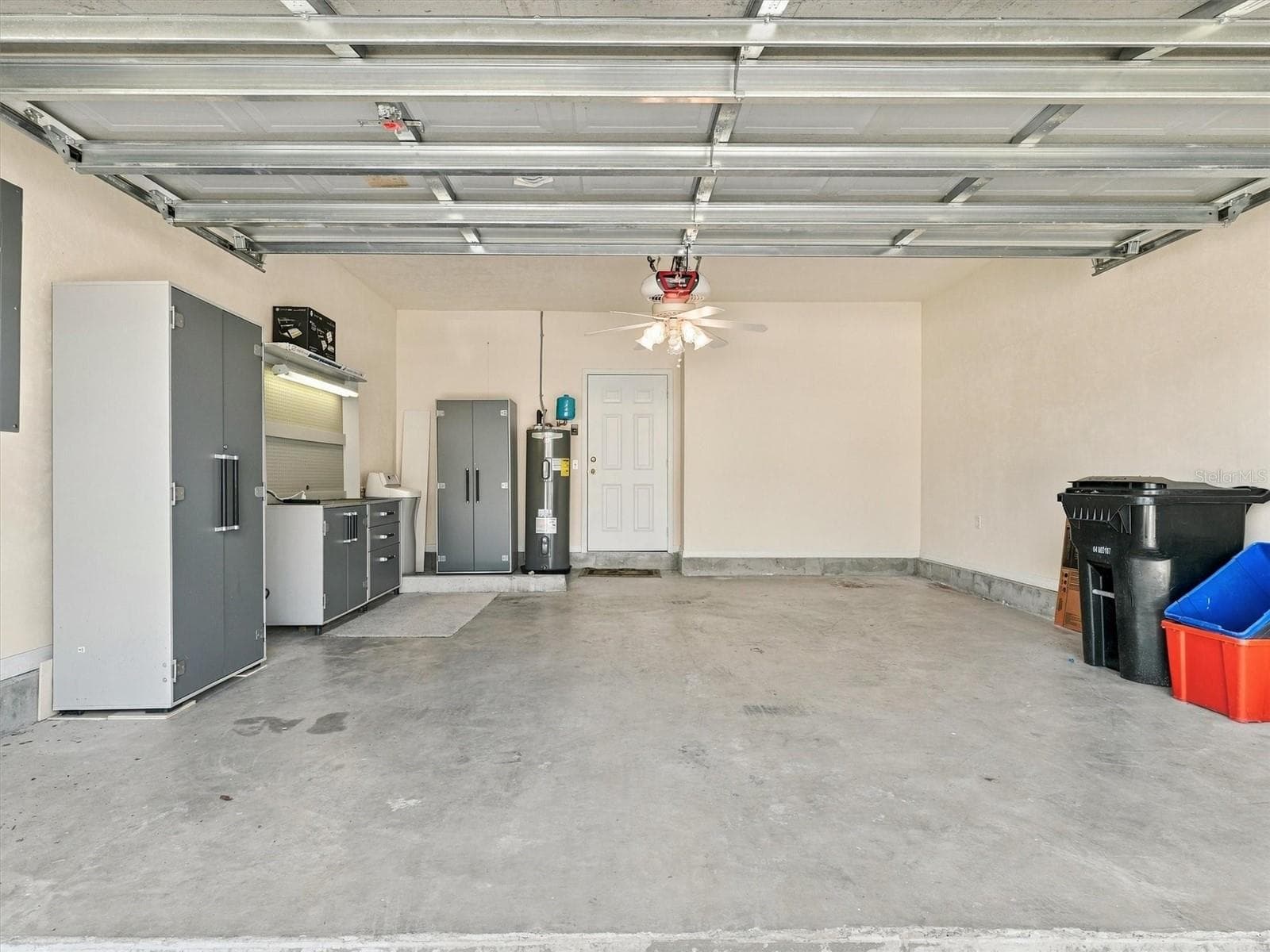 Garage includes shelfs, and work bench, wWater Softner, and New Hotwater heater Sept 2026 - 11644 NW 18TH PL, GAINESVILLE