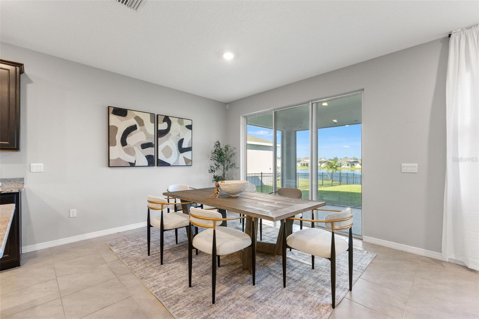 Dining area and slider - 5126 Jackel Chase Dr, Wimauma - 5126 JACKEL CHASE DR, WIMAUMA