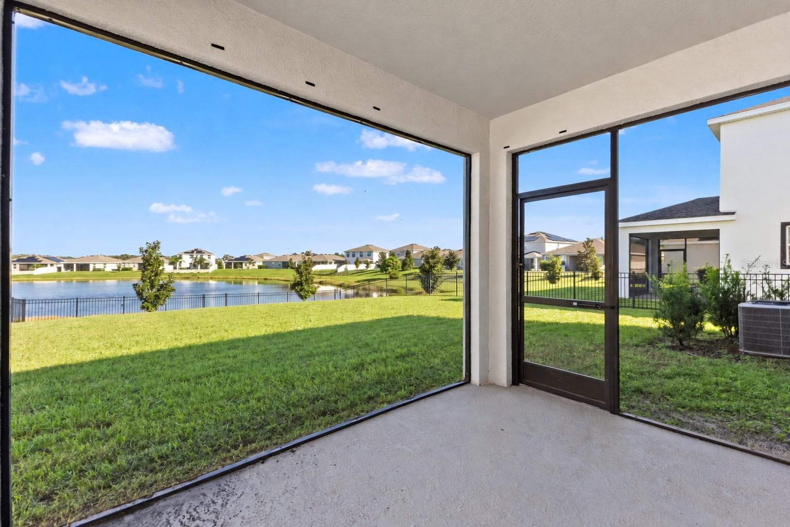 Screened lanai corner view - 5126 Jackel Chase Dr, Wimauma - 5126 JACKEL CHASE DR, WIMAUMA