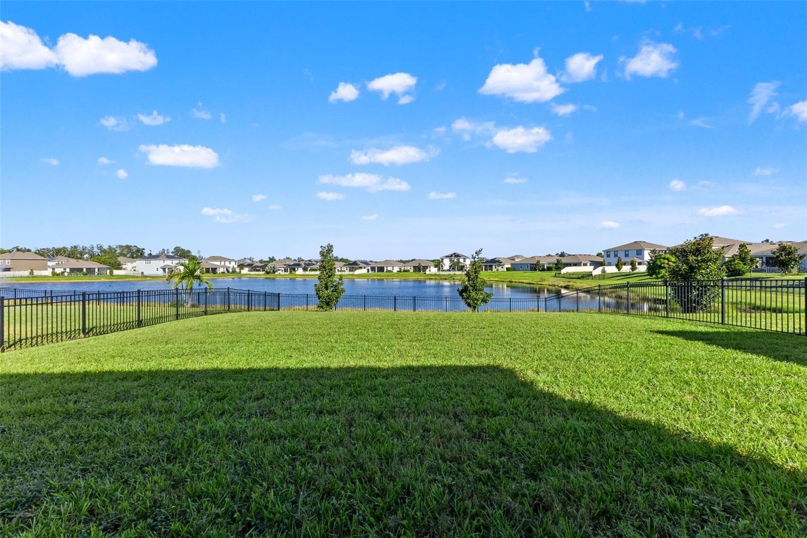 Backyard and pond outlook - 5126 Jackel Chase Dr, Wimauma - 5126 JACKEL CHASE DR, WIMAUMA
