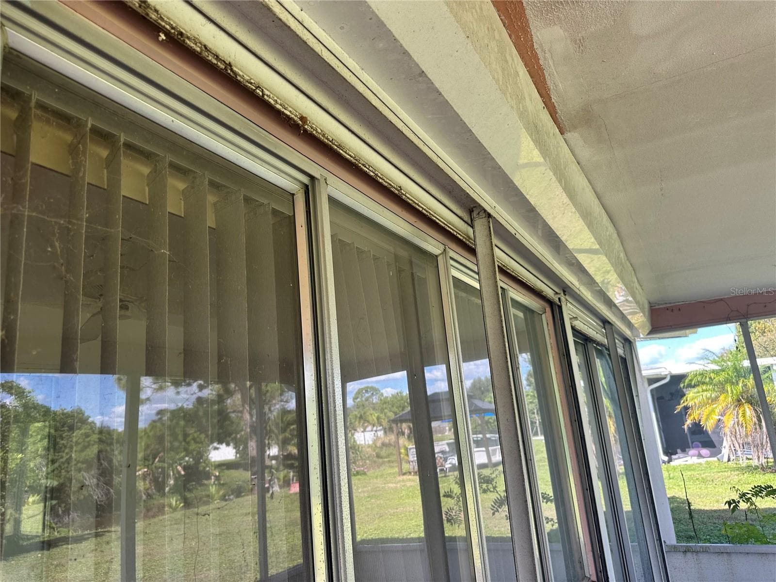 Hurricane shutters on Florida  room - 1554 INVERNESS ST, PORT CHARLOTTE