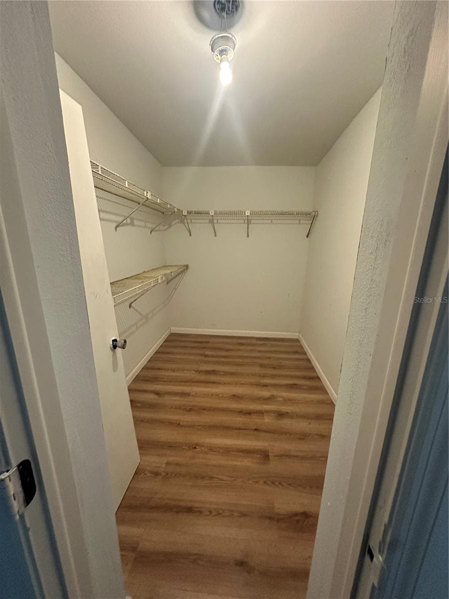 large primary closet - 1554 INVERNESS ST, PORT CHARLOTTE