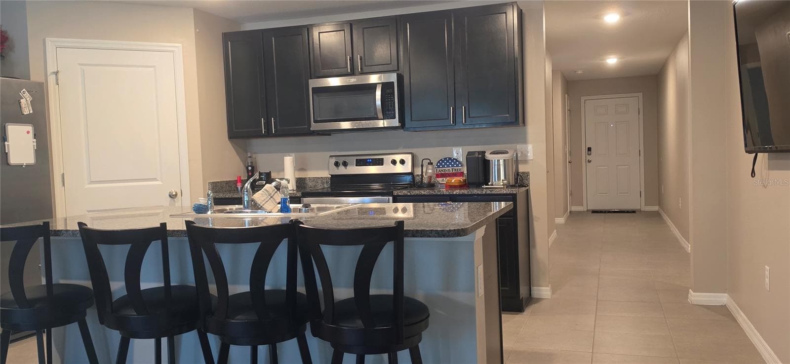 Kitchen and pantry - 7921 SAIL CLOVER LN, ZEPHYRHILLS