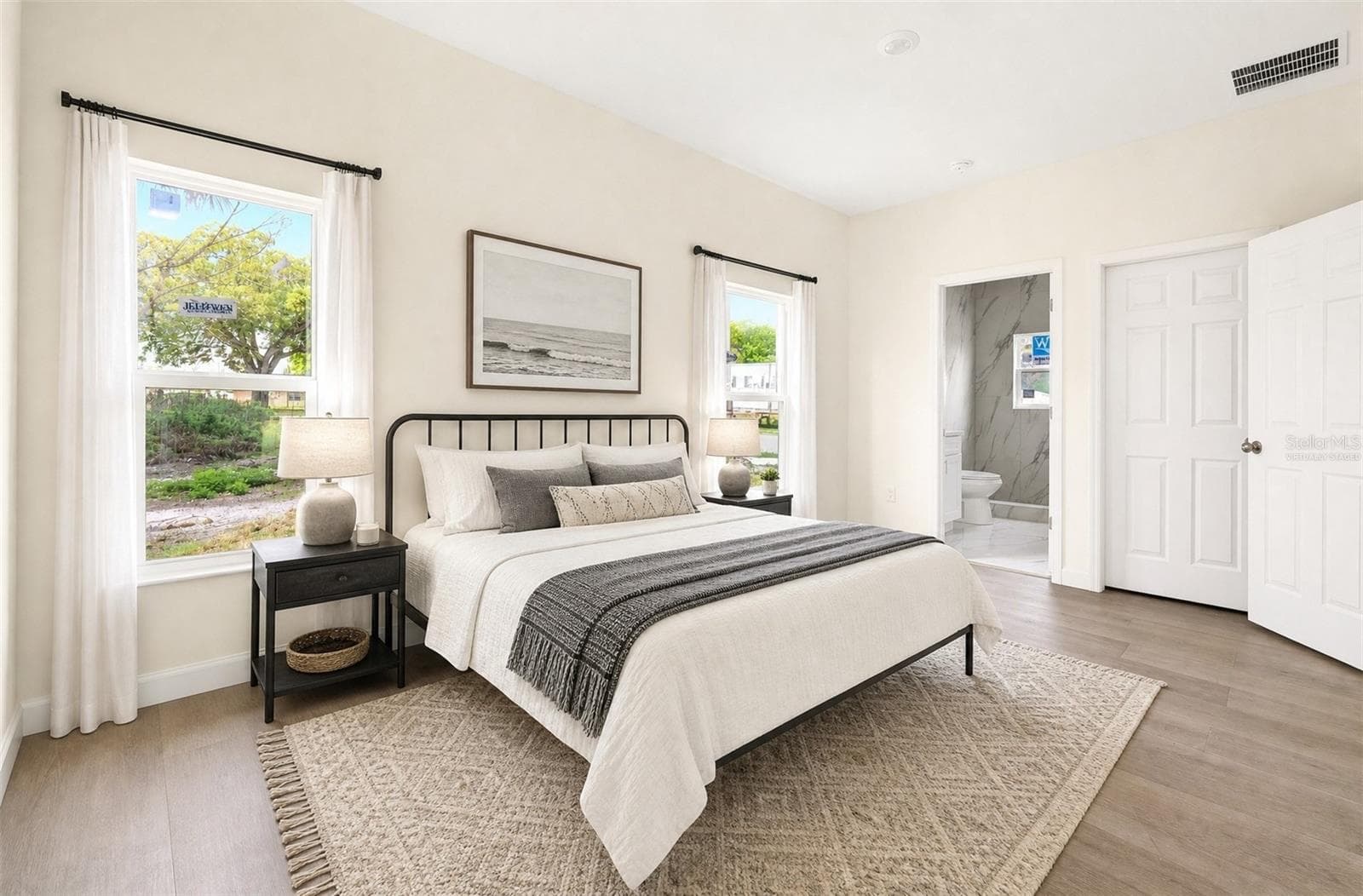 Light filled primary suite. Virtually Staged. - 702 LUCKY ST, TITUSVILLE