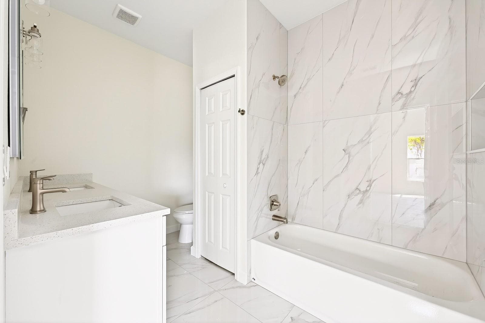 Second full bath. - 702 LUCKY ST, TITUSVILLE