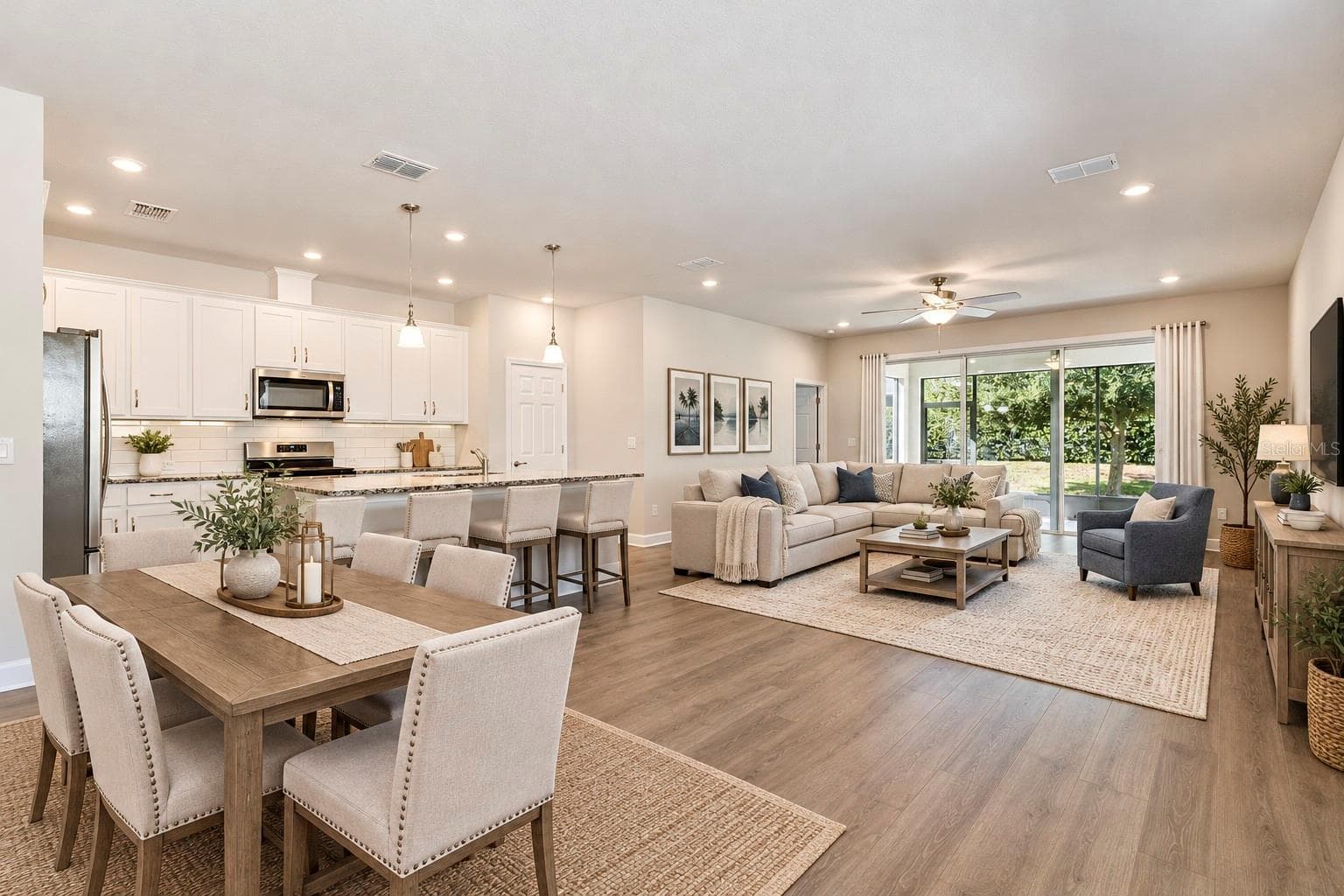 Open floor plan-kitchen and dining open to the family room - 6103 PLOVER MEADOW ST, LITHIA