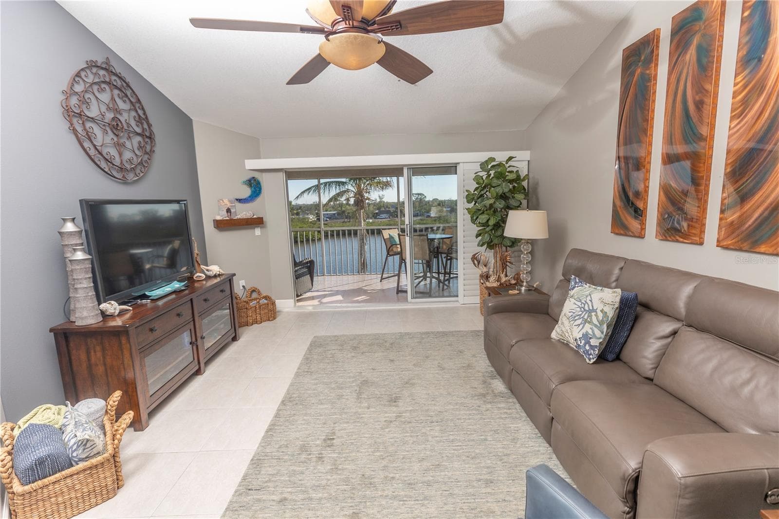 Living Room With Vaulted Ceiling Looking Out To The Water. Quality Furnishings. Condo Is being Sold Furnished! - 1401 S MCCALL RD #B-306, ENGLEWOOD