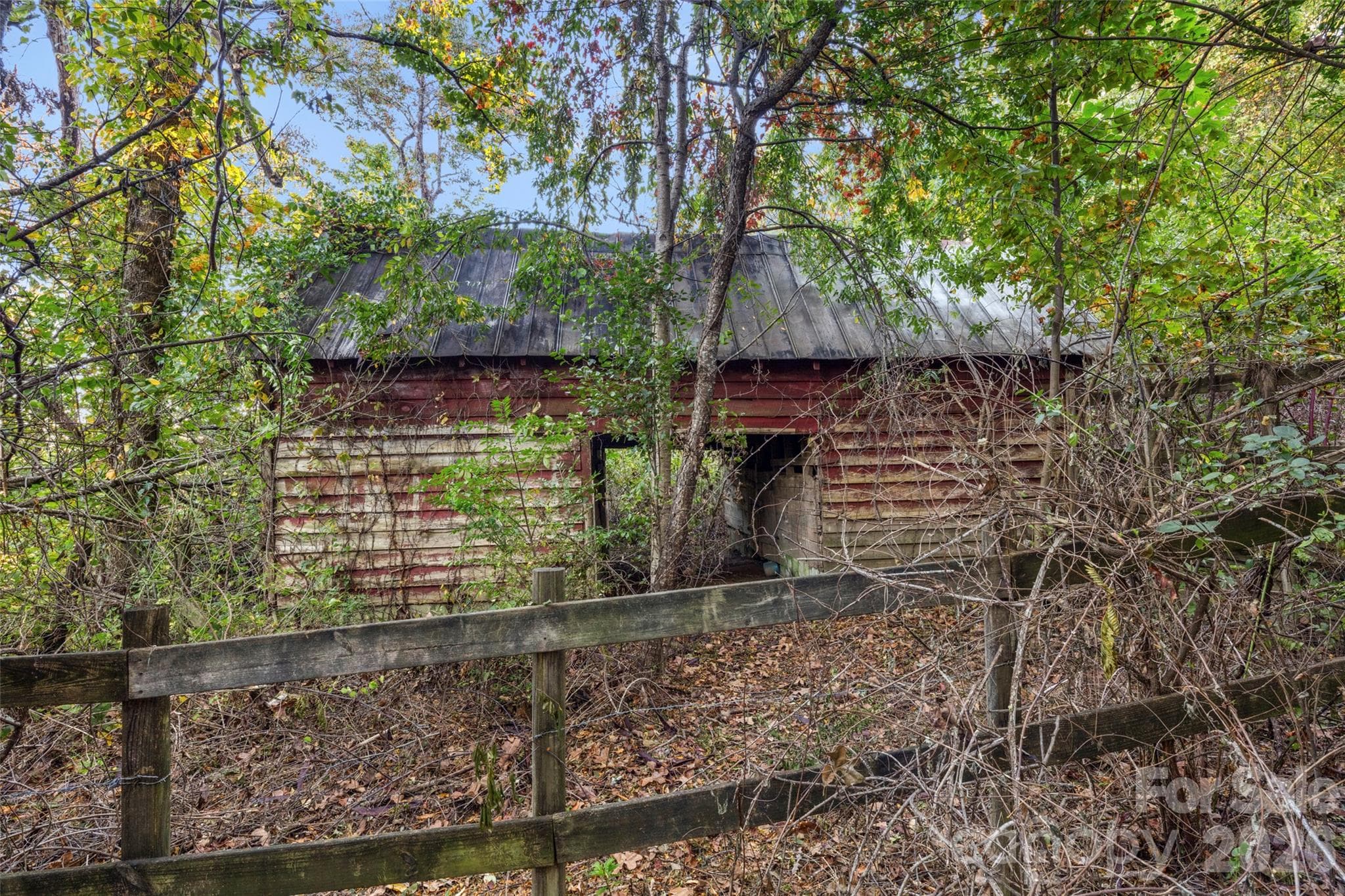 Nice sized barn with 4 small stalls on the lower level. - 81 Dena Nix Lane, Hendersonville