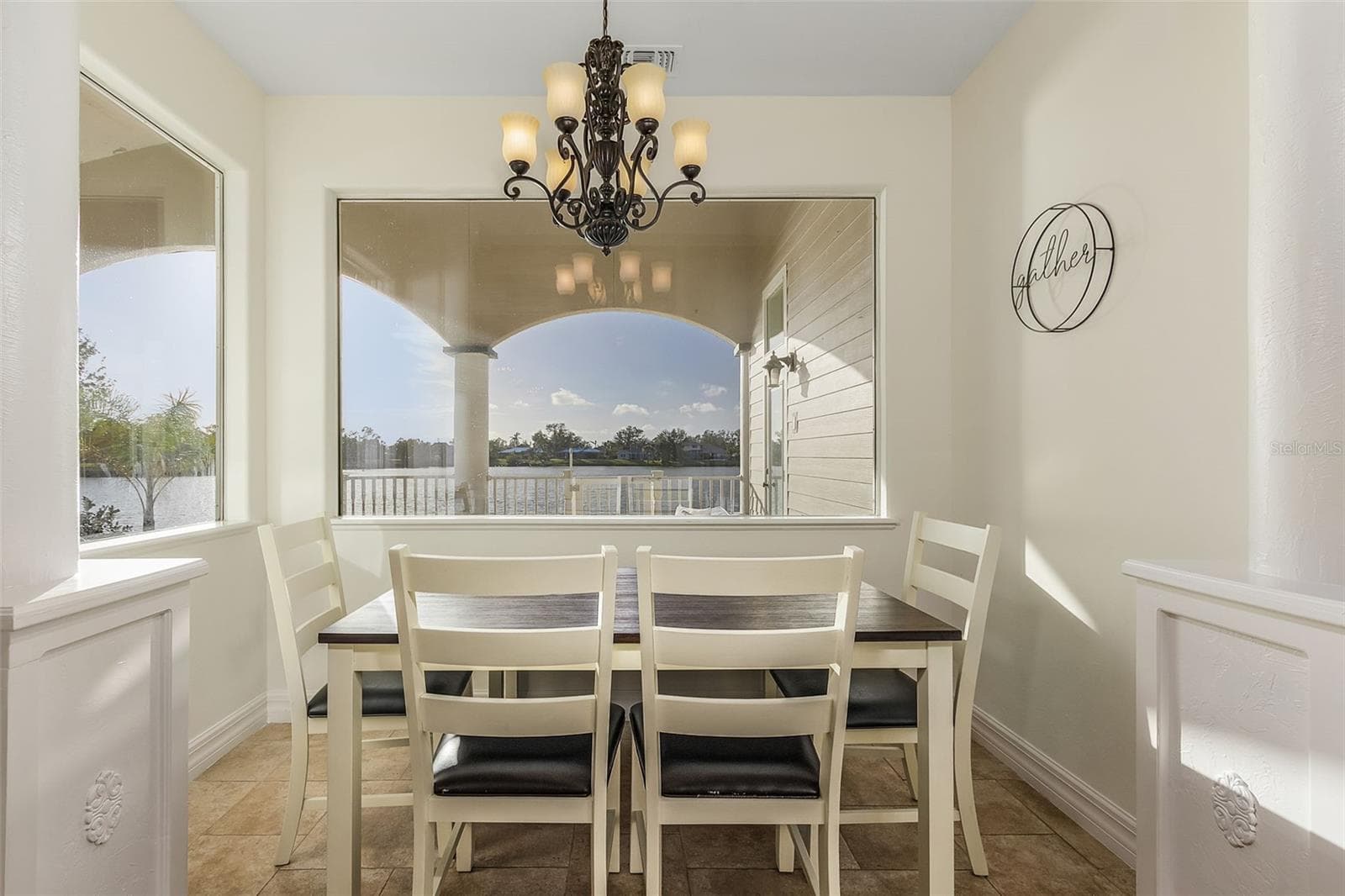 Dinette off the kitchen overlooking the lake - 197 ALBERT LN, PORT CHARLOTTE
