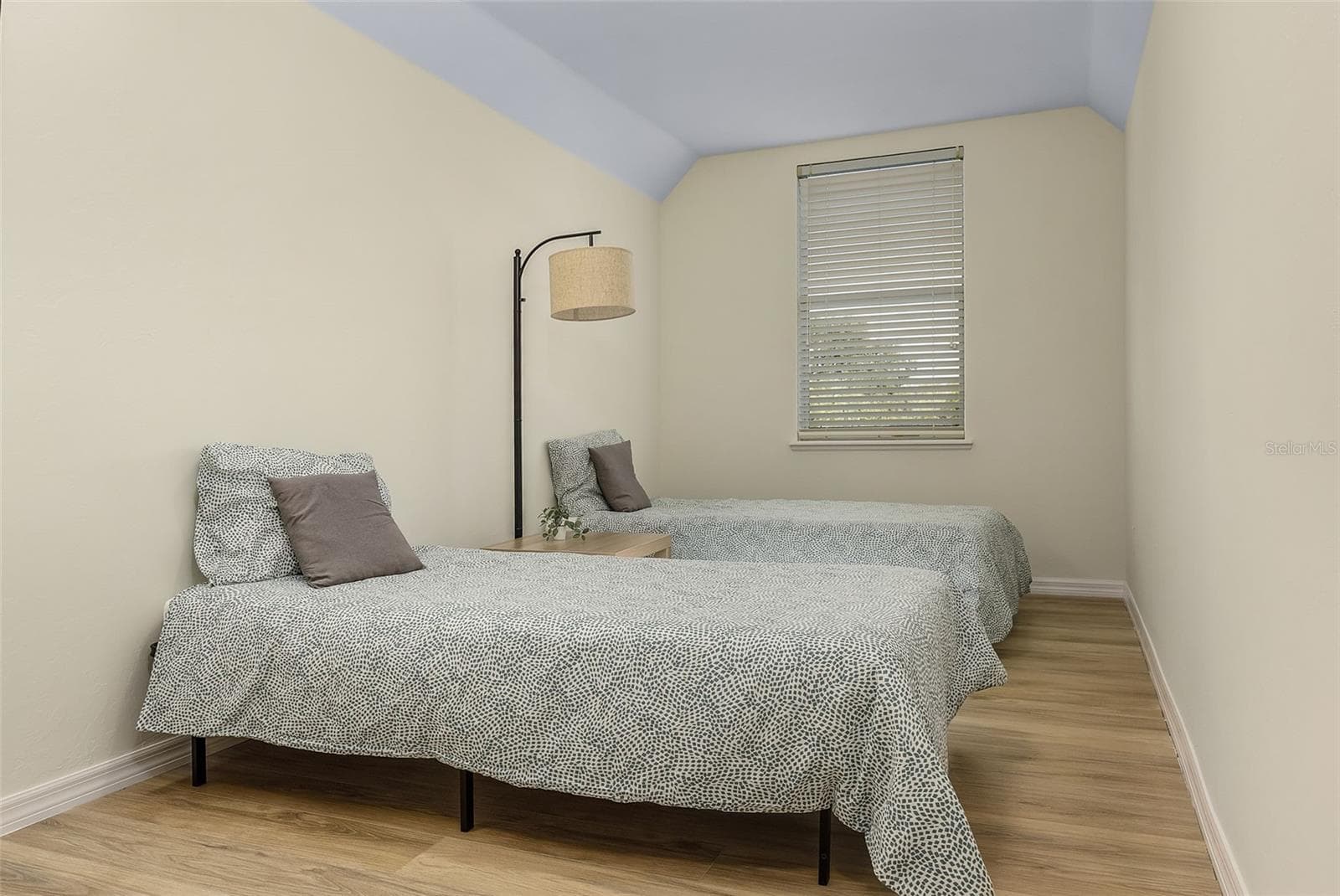 Attic bonus room off bedroom 4, use as a guest room (bedroom 5), game room, flex room, office. Has caped plumbing access also. - 197 ALBERT LN, PORT CHARLOTTE
