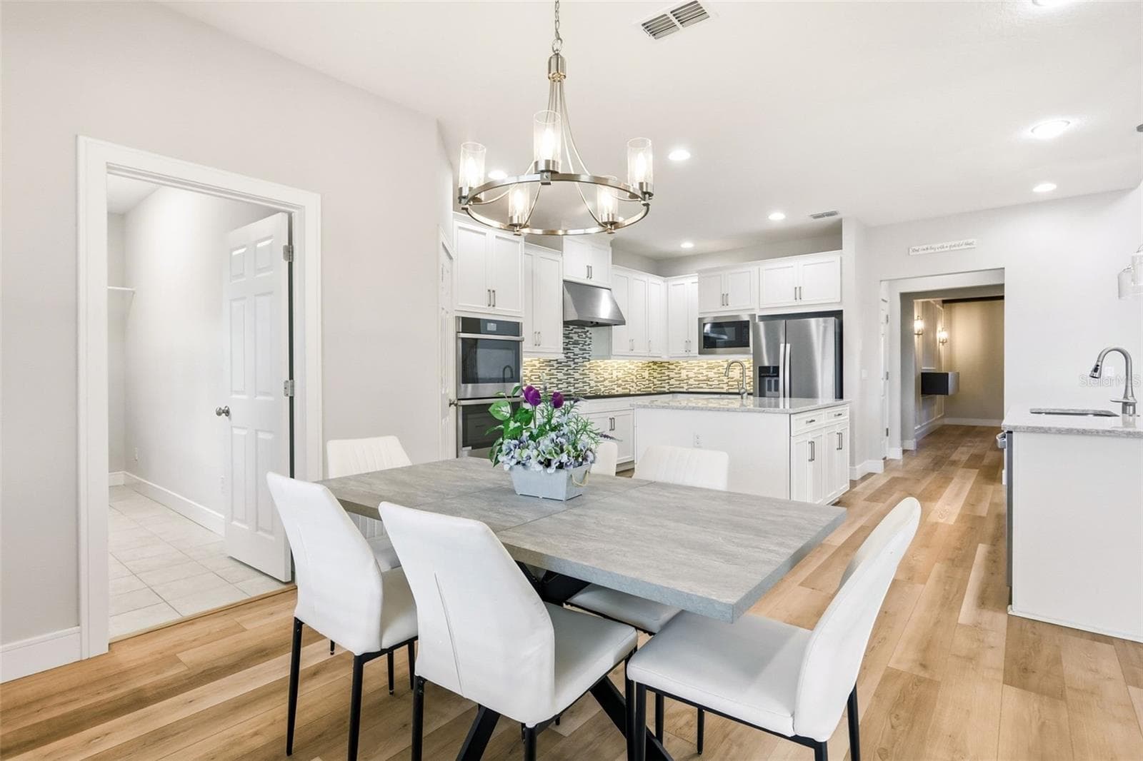 Spacious area to have morning breakfast off the kitchen - 1552 MYRTLE OAKS TRL, OVIEDO