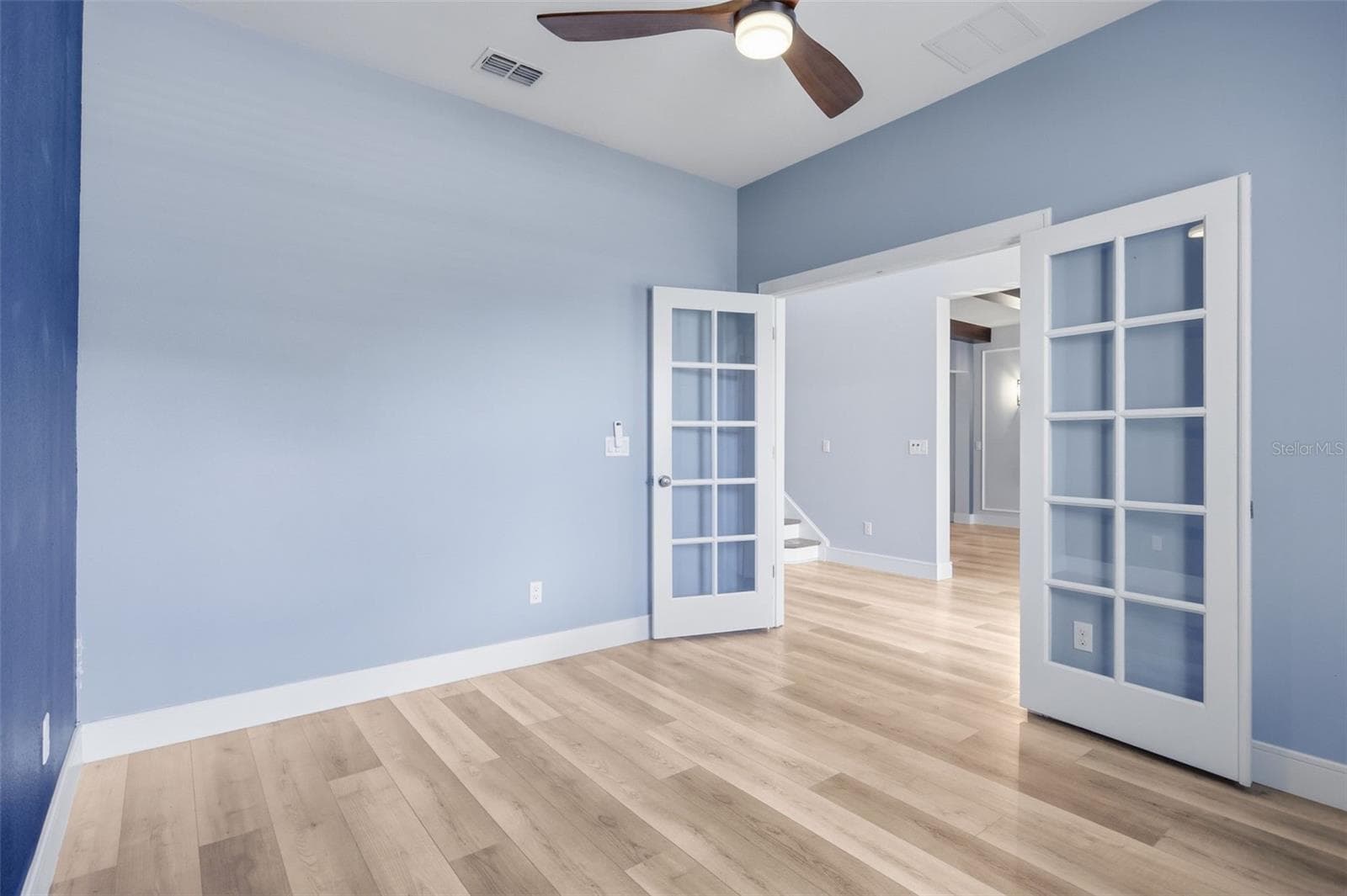 Double doors into the office at the front of the home - 1552 MYRTLE OAKS TRL, OVIEDO