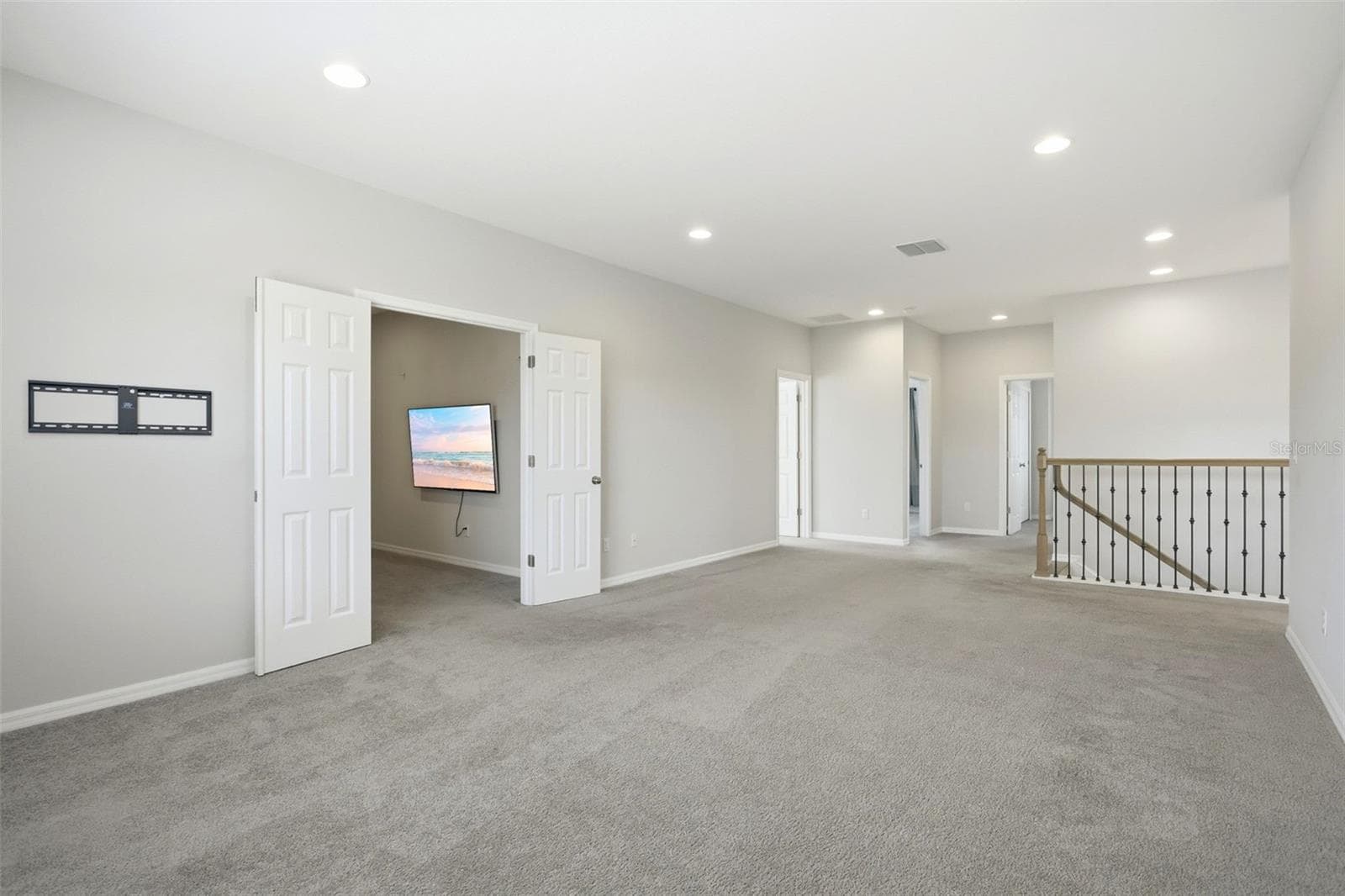 Double door lead into the separate media room - 1552 MYRTLE OAKS TRL, OVIEDO
