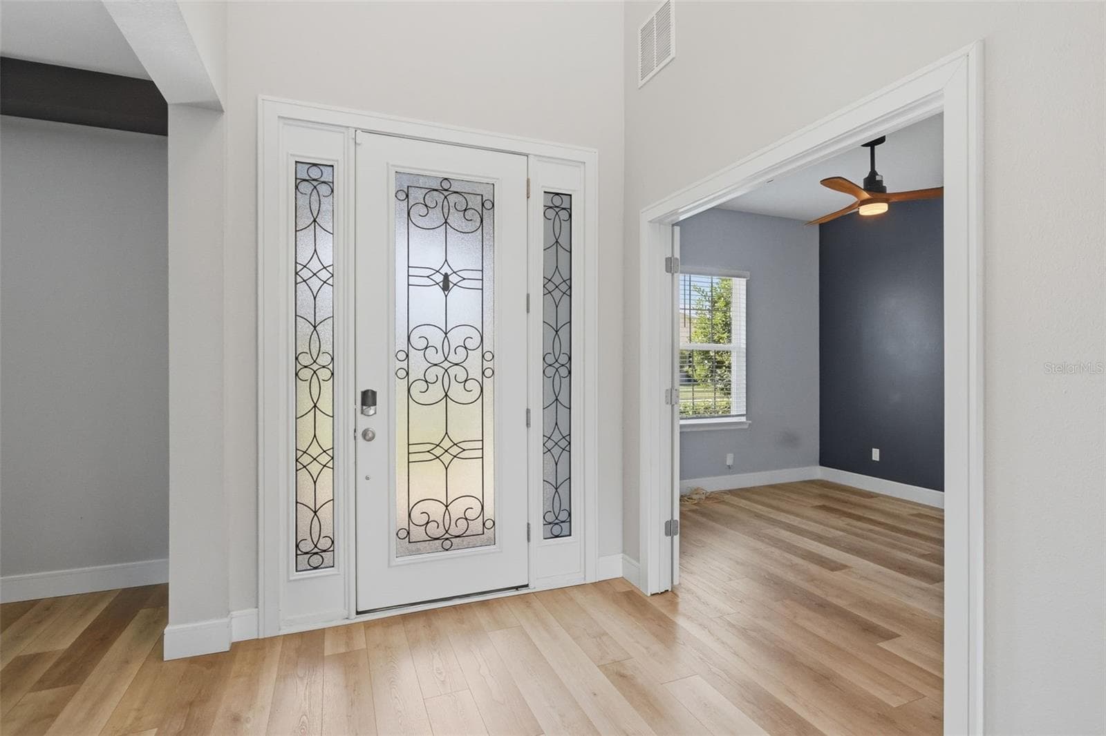 Entrance with dining area on one side and office on the other - 1552 MYRTLE OAKS TRL, OVIEDO