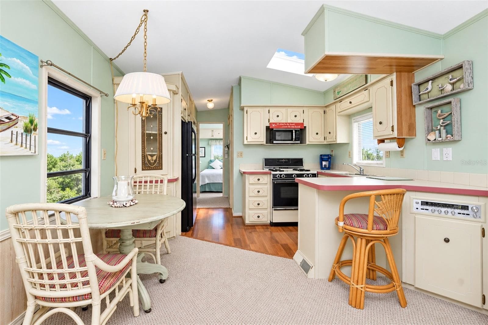 dining area and kitchen - 39 CROWN POINT DR, NOKOMIS