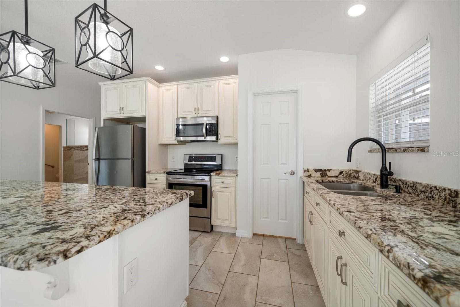 Full second kitchen! Granite countertops and custom cabinets! - 1105 DEER RUN PL, VALRICO
