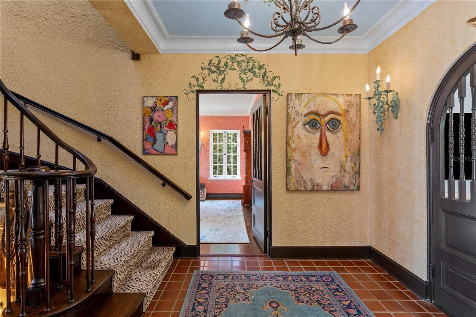 From the Foyer looking towards the Dining Room, notice the curved doors towards the Parlor on the right. - 7211 3RD AVE S, ST PETERSBURG