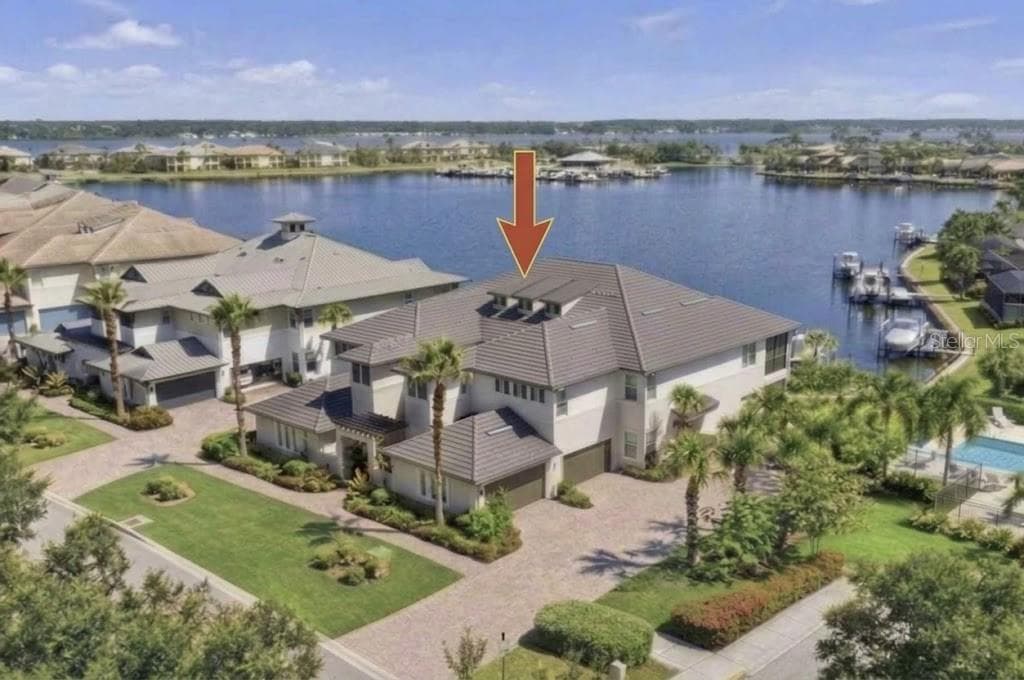 Ideal location for best water views, step-out-the door pool access, but on the opposite side of the building from the satellite pool. - 1009 RIVERSCAPE ST #1009, BRADENTON