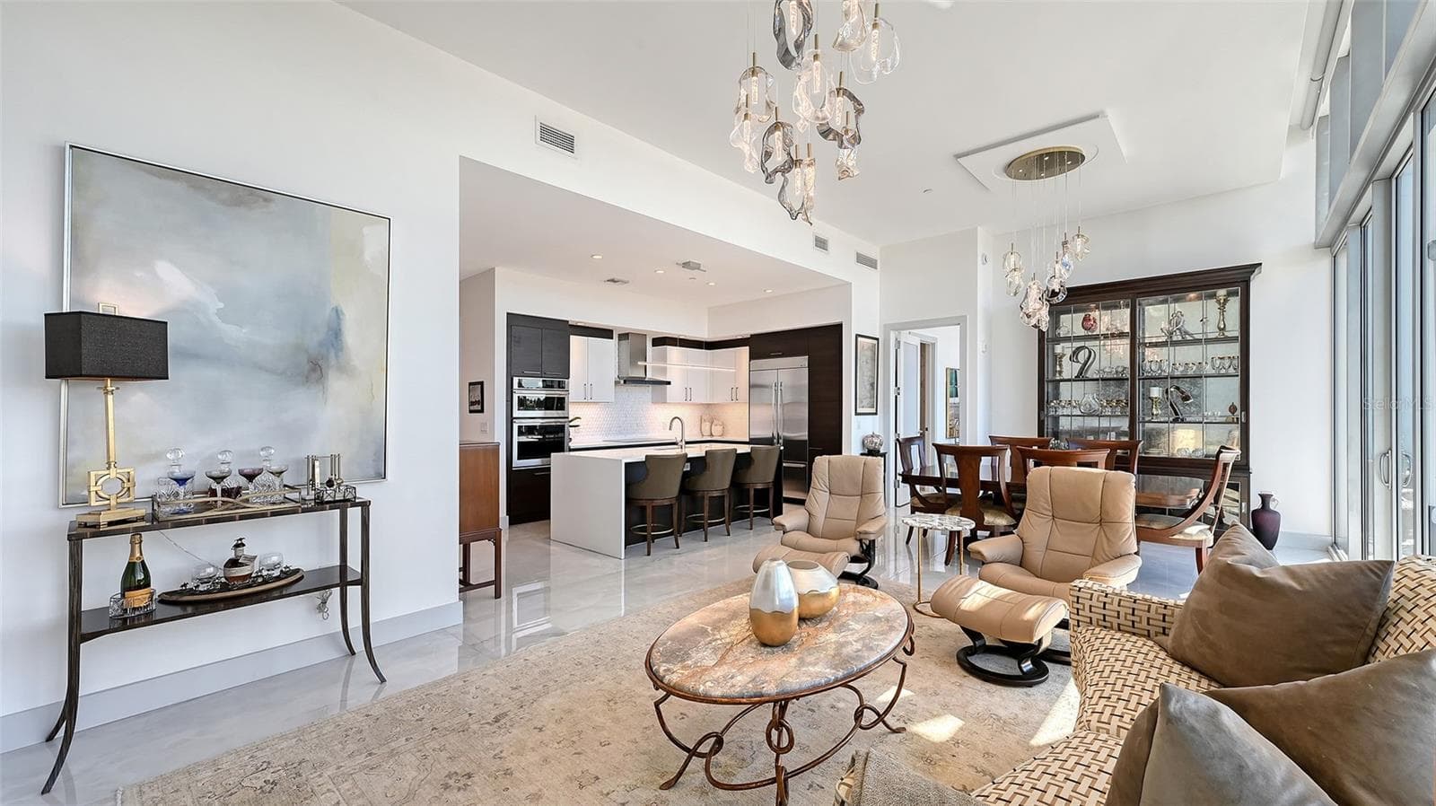 An inviting, spacious living room designed for comfort, relaxation, and effortless elegance. - 1155 N GULFSTREAM AVE #207, SARASOTA