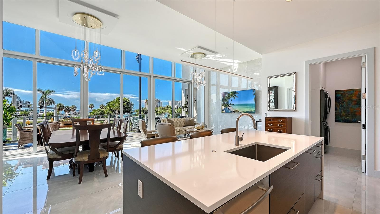Enjoy the generous island with bar seating, perfect for casual dining and sophisticated entertaining. - 1155 N GULFSTREAM AVE #207, SARASOTA