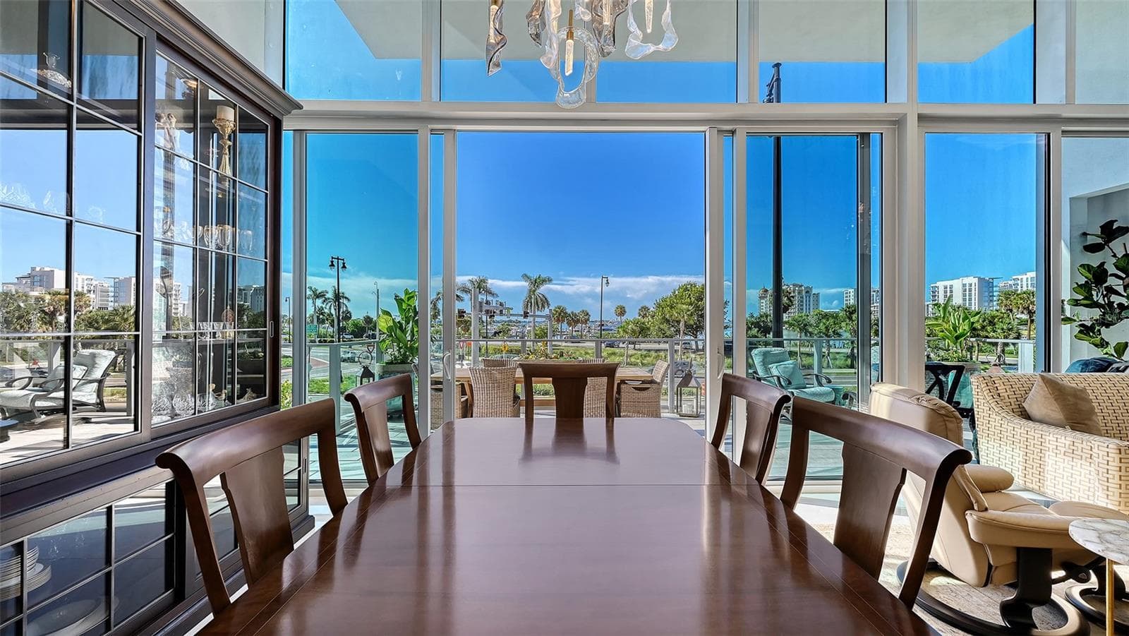 Bathed in natural light, this refined space offers the perfect setting for memorable dining and upscale entertaining. - 1155 N GULFSTREAM AVE #207, SARASOTA