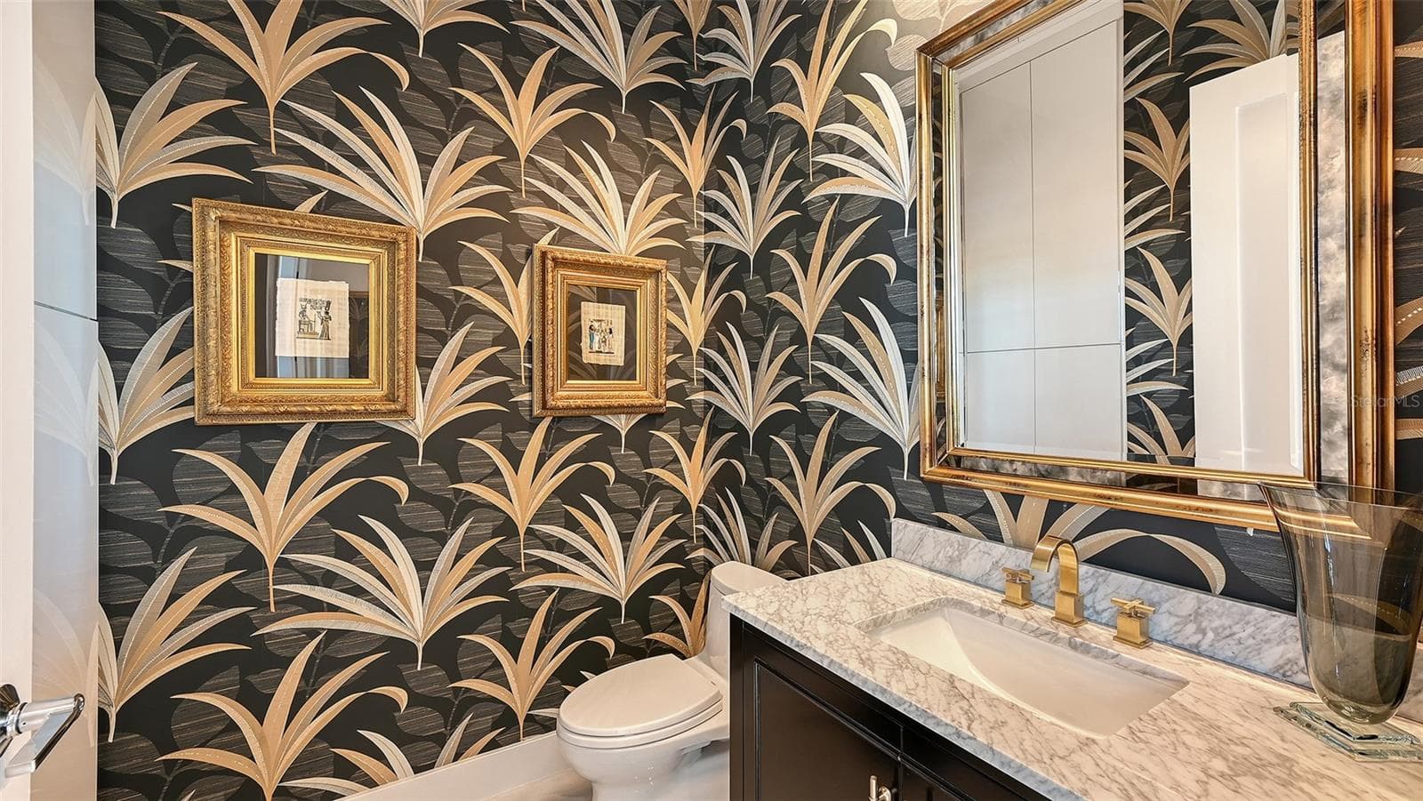 Elegant powder room adorned with exquisite designer wallpaper and refined finishes. - 1155 N GULFSTREAM AVE #207, SARASOTA