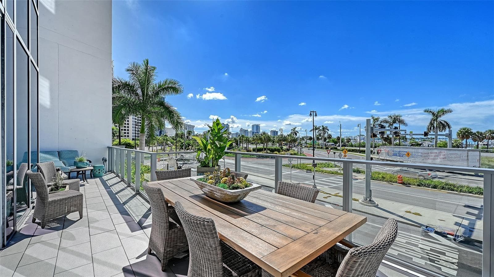 Savor breathtaking morning sunrises as golden light illuminates the private terrace. - 1155 N GULFSTREAM AVE #207, SARASOTA
