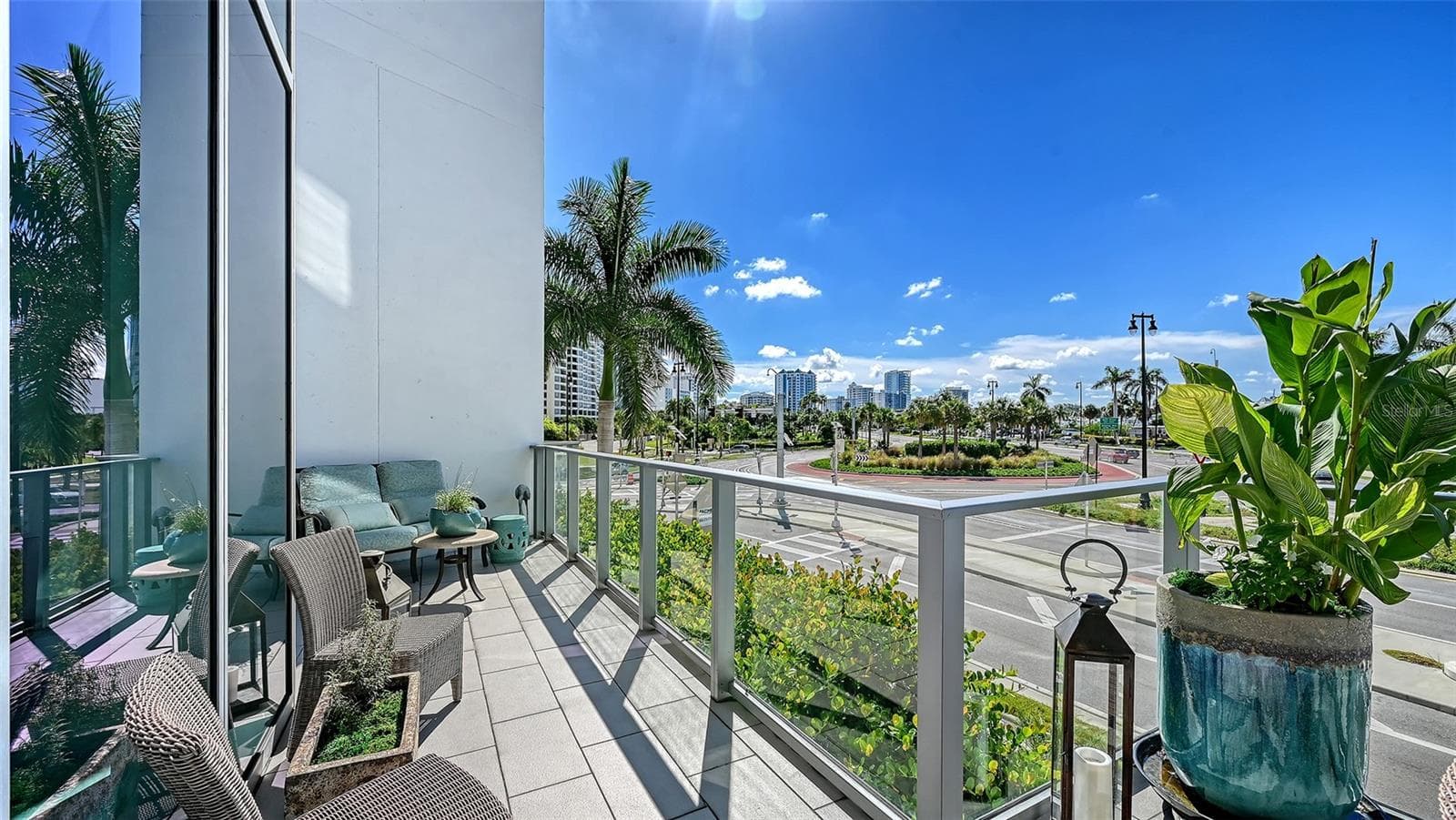 Relax and unwind in multiple inviting lounge areas on the expansive private terrace. - 1155 N GULFSTREAM AVE #207, SARASOTA