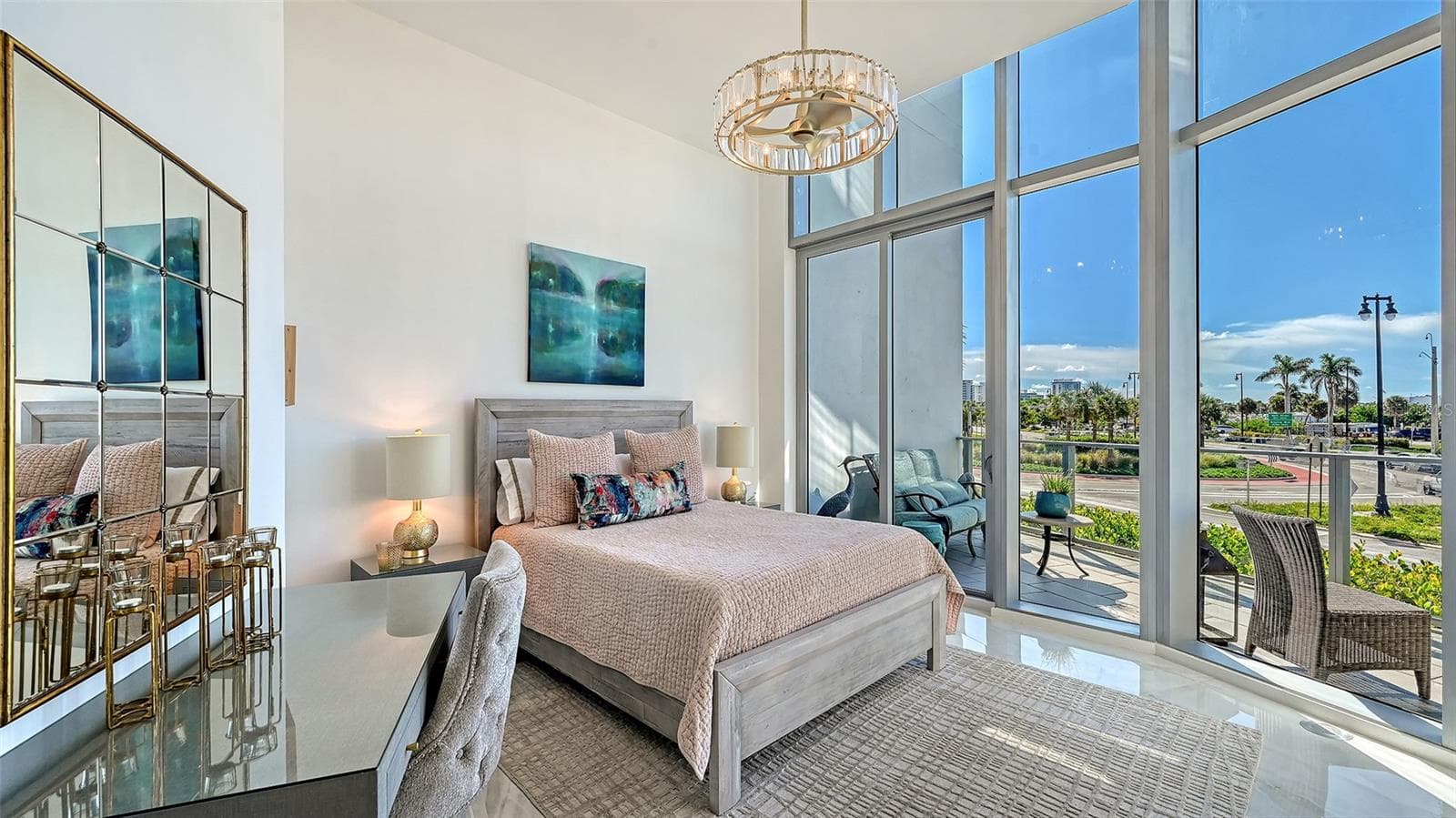 A bright, serene primary suite filled with natural light, offering an elegant retreat with sophisticated finishes and a calming, airy ambiance. - 1155 N GULFSTREAM AVE #207, SARASOTA